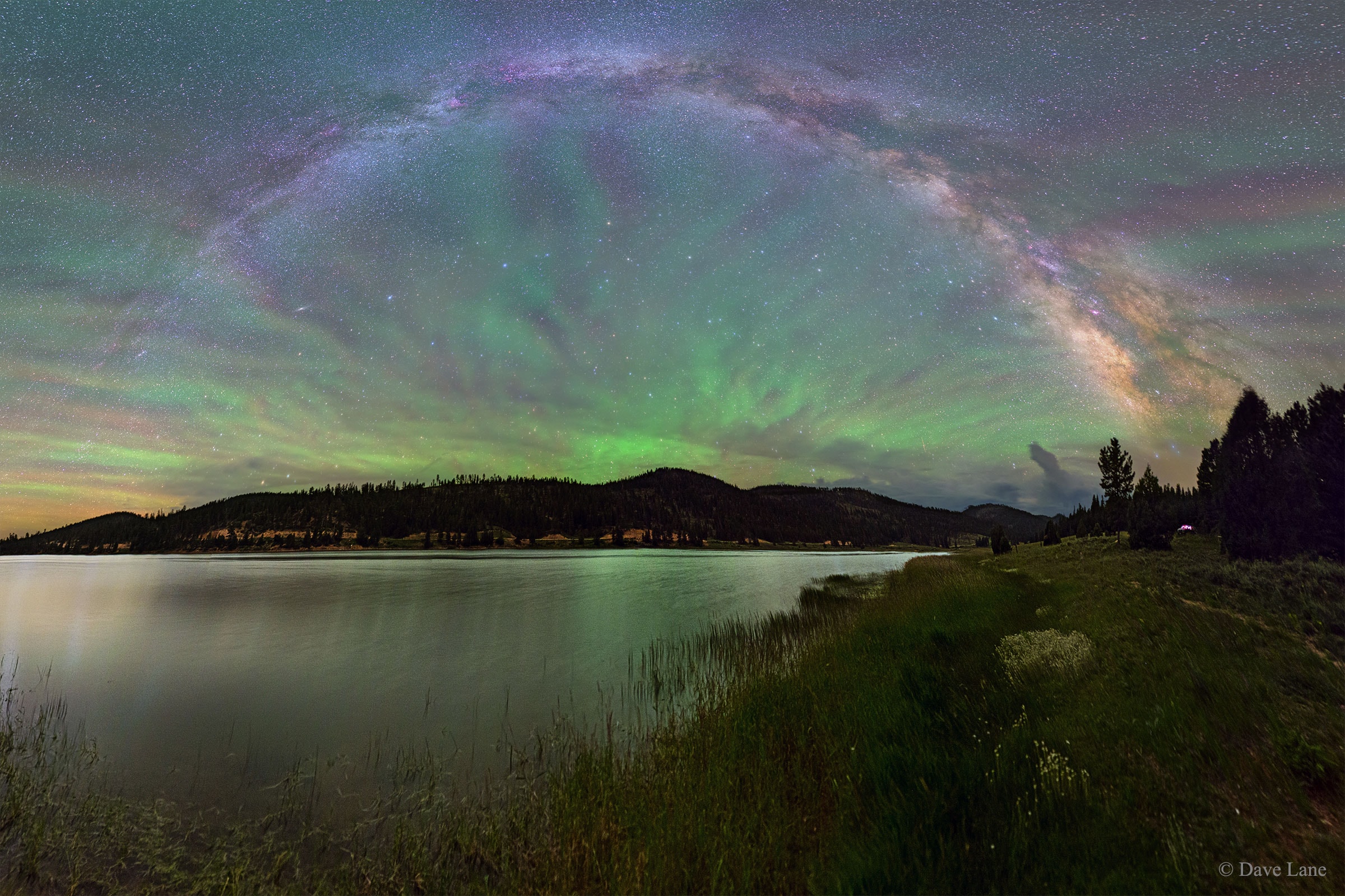 Why would the sky look like a giant fan? Airglow. The featured intermittent green glow appeared to rise from a lake through the arch of our Milky Way Galaxy, as captured during 2015 next to Bryce Canyon in Utah, USA.  The unusual pattern was created by atmospheric gravity waves, ripples of alternating air pressure that can grow with height as the air thins, in this case about 90 kilometers up.  Unlike auroras powered by collisions with energetic charged particles and seen at high latitudes, airglow is due to chemiluminescence, the production of light in a chemical reaction.  More typically seen near the horizon, airglow keeps the night sky from ever being completely dark.   Follow APOD on: Instagram, Facebook,  Reddit, or Twitter