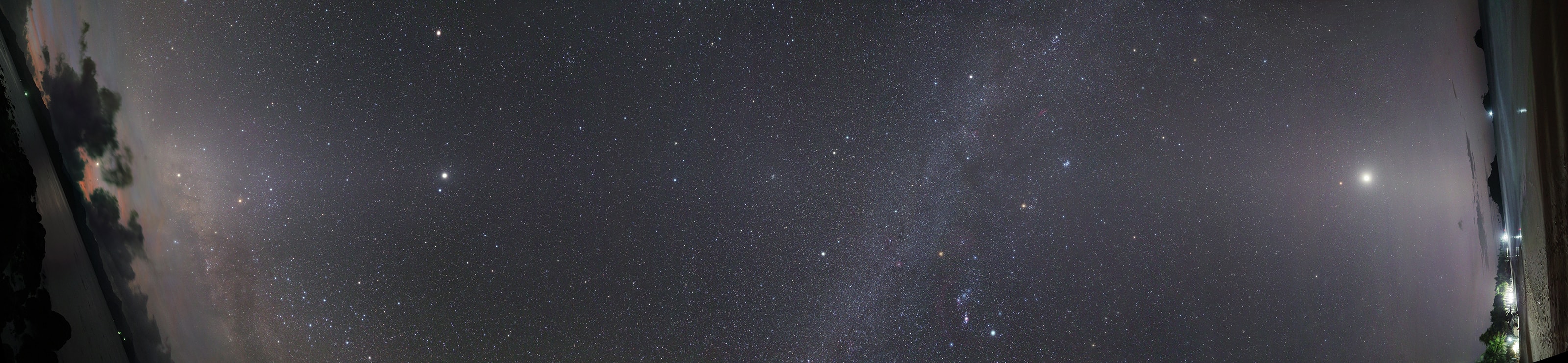 For 360 degrees, a view along the plane of the ecliptic is captured in this remarkable panorama, with seven planets in a starry sky. The mosaic was constructed using images taken during January 24-26, from Nacpan Beach, El Nido in Palawan, Philippines. It covers the eastern horizon (left) in dark early morning hours and the western horizon in evening skies. While the ecliptic runs along the middle traced by a faint band of zodiacal light, the Milky Way also cuts at angles through the frame. Clouds and the Moon join fleeting planet Mercury in the east. Yellowish Saturn, bright star Antares, and Jupiter lie near the ecliptic farther right. Hugging the ecliptic near center are Leo's alpha star Regulus and star cluster M44. The evening planets gathered along the ecliptic above the western horizon, are faint Uranus, ruddy Mars, brilliant Venus, and even fainter Neptune. A well labeled version of the panorama can be viewed by sliding your cursor over the picture, or just following this link.