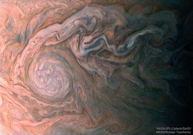 This storm cloud on Jupiter is almost as large as the Earth.  Known as a white oval, the swirling cloud is a high pressure system equivalent to an Earthly anticyclone. The cloud is one of a "string of pearls" ovals south of Jupiter's famous Great Red Spot.  Possibly, the Great Red Spot is just a really large white oval that turned red.  Surrounding clouds show interesting turbulence as they flow around and past the oval.  The featured image was captured on February 2 as NASA's robotic spacecraft Juno made a new pass just above the cloud tops of the Jovian world.  Over the next few years, Juno will continue to orbit and probe Jupiter, determine atmospheric water abundance, and attempt to determine if Jupiter has a solid surface beneath its thick clouds.