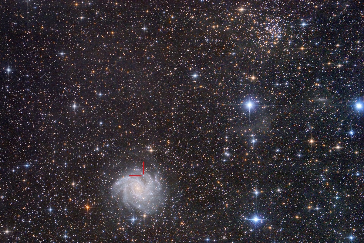A cosmic snapshot from May 19, this colorful telescopic field of view spans about 1 degree or 2 full moons on the sky. Spiky in appearance, foreground Milky Way stars are scattered toward the royal constellation Cepheus while stars of open cluster NGC 6939 gather about 5 thousand light-years in the distance near the top of the frame. Face-on spiral galaxy NGC 6946 is toward the lower left nearly 22 million light-years away. The helpful red lines identify recently discovered supernova SN 2017eaw, the death explosion of a massive star nestled in the galaxy's bluish spiral arms. In fact in the last 100 years, 10 supernovae have been discovered in NGC 6946. By comparison, the average rate of supernovae in our Milky Way is about 1 every 100 years or so. Of course, NGC 6946 is also known as The Fireworks Galaxy.
