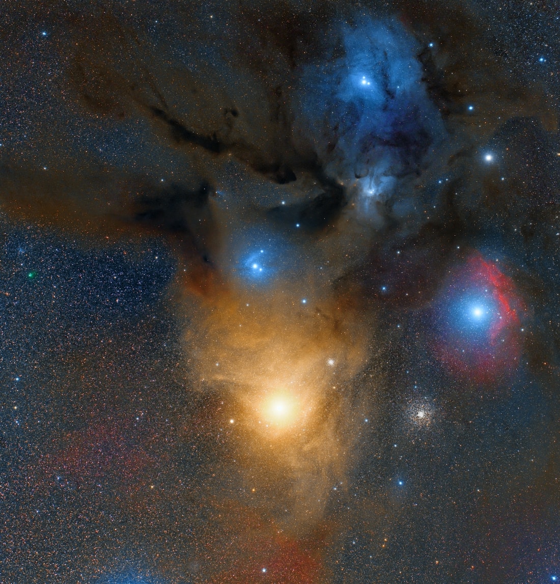 Sweeping through this stunning field of view, Comet 71P/Clark really is in the foreground of these cosmic clouds. The 2 panel telescopic mosaic is color enhanced and is about 5 degrees (10 full moons) across. It captures the faint comet's position on the night of May 23/24 over 5 light-minutes from Earth, very near the line-of-sight to bright star Antares and the Rho Ophiuchi cloud complex. In the frame Antares, also known as Alpha Scorpii, is at bottom center surrounded by a dusty cosmic cloud reflecting the cool giant star's yellowish light. Globular star cluster M4 shines just right of Antares, but M4 lies some 7,000 light-years away compared to Antares' 500 light-year distance. Slightly closer than Antares, Rho Ophiuchi's bluish starlight is reflected by the dust in molecular clouds toward the top. You can spot the small coma and short tail of the comet as a faint smudge near the center of the left edge of the frame. Just look for the comet's striking greenish color, produced as diatomic carbon molecules fluoresce in sunlight.