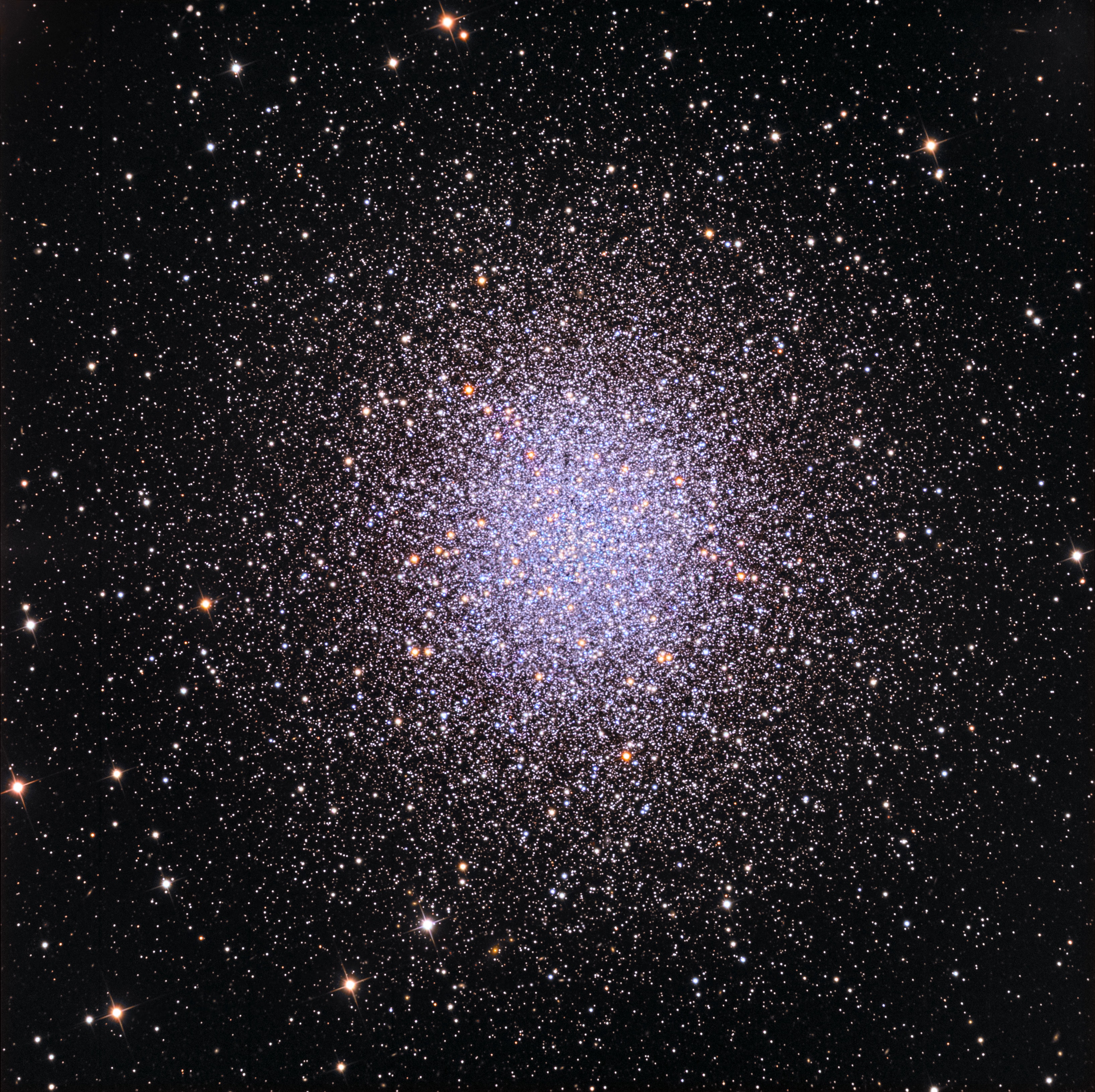 In 1716, English astronomer Edmond Halley noted, "This is but a little Patch, but it shews itself to the naked Eye, when the Sky is serene and the Moon absent." Of course, M13 is now less modestly recognized as the Great Globular Cluster in Hercules, one of the brightest globular star clusters in the northern sky. Telescopic views reveal the spectacular cluster's hundreds of thousands of stars. At a distance of 25,000 light-years, the cluster stars crowd into a region 150 light-years in diameter. Approaching the cluster core upwards of 100 stars could be contained in a cube just 3 light-years on a side. For comparison, the closest star to the Sun is over 4 light-years away. Along with the cluster's dense core, the outer reaches of M13 are highlighted in this sharp color image. The cluster's evolved red and blue giant stars show up in yellowish and blue tints.