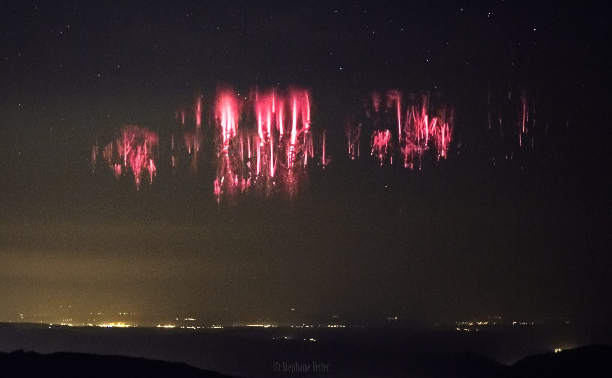 Mysterious and incredibly brief, red sprites are seen to occur high above large thunderstorms on planet Earth. While they have been recorded from low Earth orbit or high flying airplanes, these dancing, lightning-like events were captured in video frames from a mountain top perch in northern France. Taken during the night of May 28, the remarkably clear, unobstructed view looks toward a multicell storm system raging over the English Channel about 600 kilometers away.  Lasting only a few milliseconds, the red sprite association with thunderstorms is known. Still, much remains a mystery about the fleeting apparitions including the nature of their relation to other upper atmospheric lightning phenomena such as blue jets or satellite detected terrestrial gamma flashes.