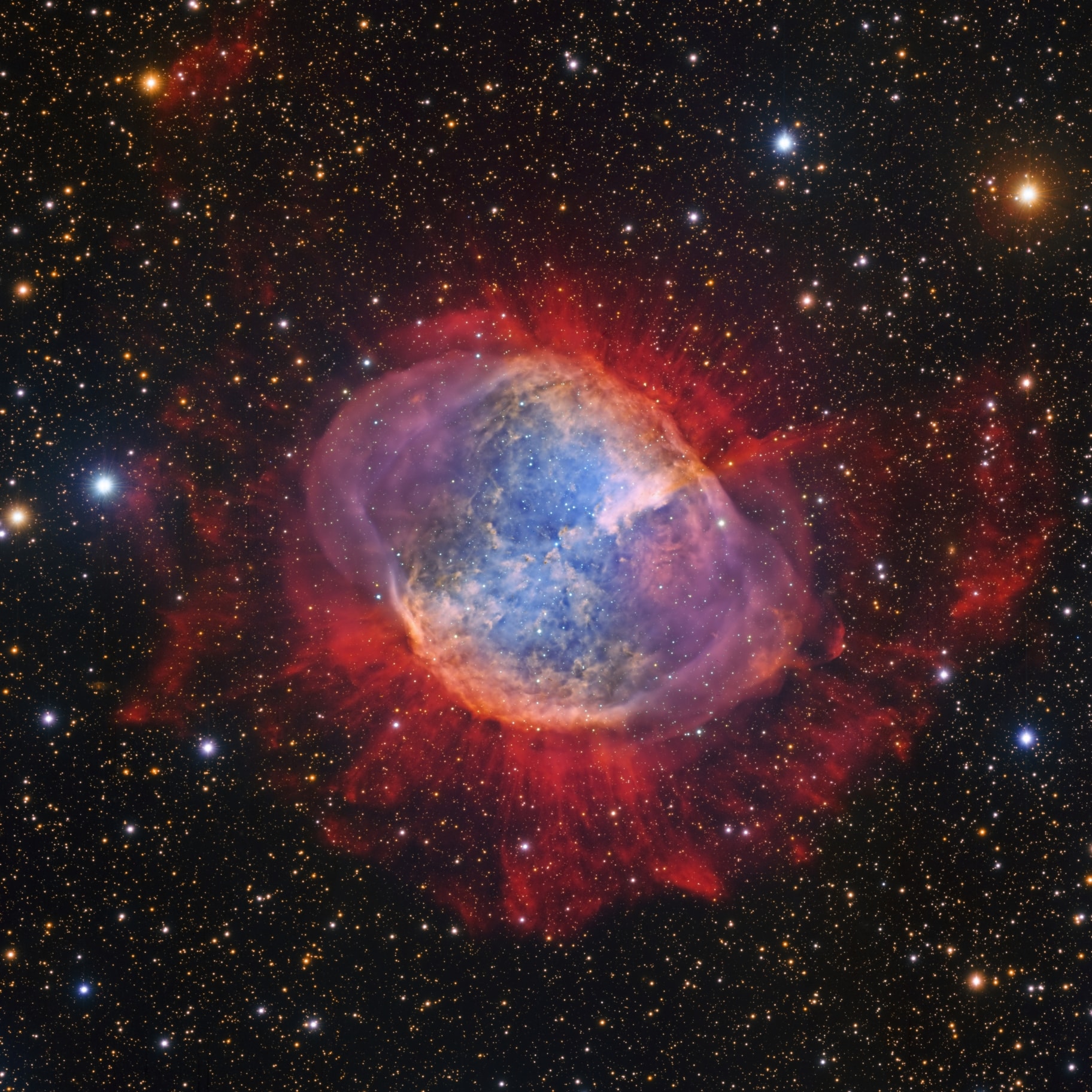 While hunting for comets in the skies above 18th century France, astronomer Charles Messier diligently kept a list of the things he encountered that were definitely not comets. This is number 27 on his now famous not-a-comet list. In fact, 21st century astronomers would identify it as a planetary nebula, but it's not a planet either, even though it may appear round and planet-like in a small telescope. Messier 27 (M27) is an excellent example of a gaseous emission nebula created as a sun-like star runs out of nuclear fuel in its core. The nebula forms as the star's outer layers are expelled into space, with a visible glow generated by atoms excited by the dying star's intense but invisible ultraviolet light. Known by the popular name of the Dumbbell Nebula, the beautifully symmetric interstellar gas cloud is over 2.5 light-years across and about 1,200 light-years away in the constellation Vulpecula. This spectacular color image incorporates broad and narrowband observations recorded by the 8.2 meter Subaru telescope.