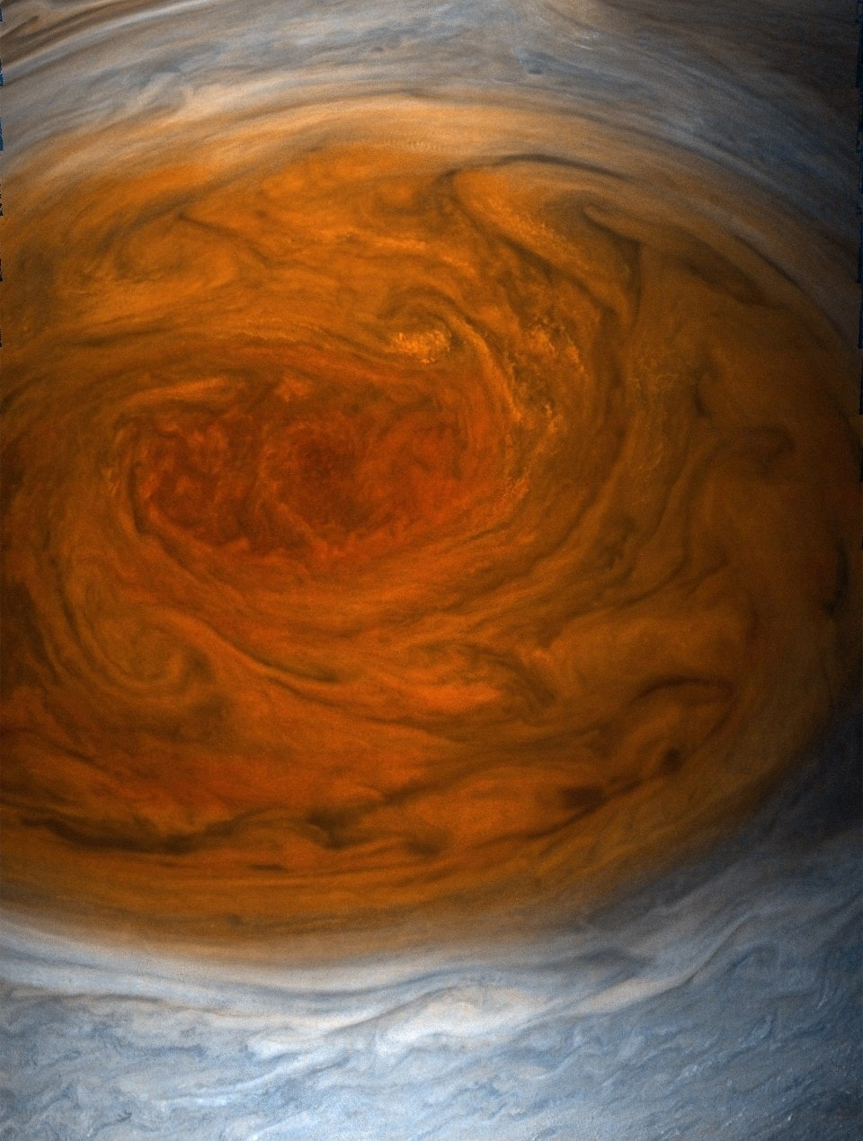 On July 11, the Juno spacecraft once again swung near to Jupiter's turbulent cloud tops in its looping 53 day orbit around the Solar System's ruling gas giant. About 11 minutes after perijove 7, its closest approach on this orbit, it passed directly above Jupiter's Great Red Spot. During the much anticipated fly over, it captured this close-up image data from a distance of less than 10,000 kilometers. The raw JunoCam data was subsequently processed by citizen scientists. Very long-lived but found to be shrinking, the Solar System's largest storm system was measure to be 16,350 kilometers wide on April 15. That's about 1.3 times the diameter of planet Earth.