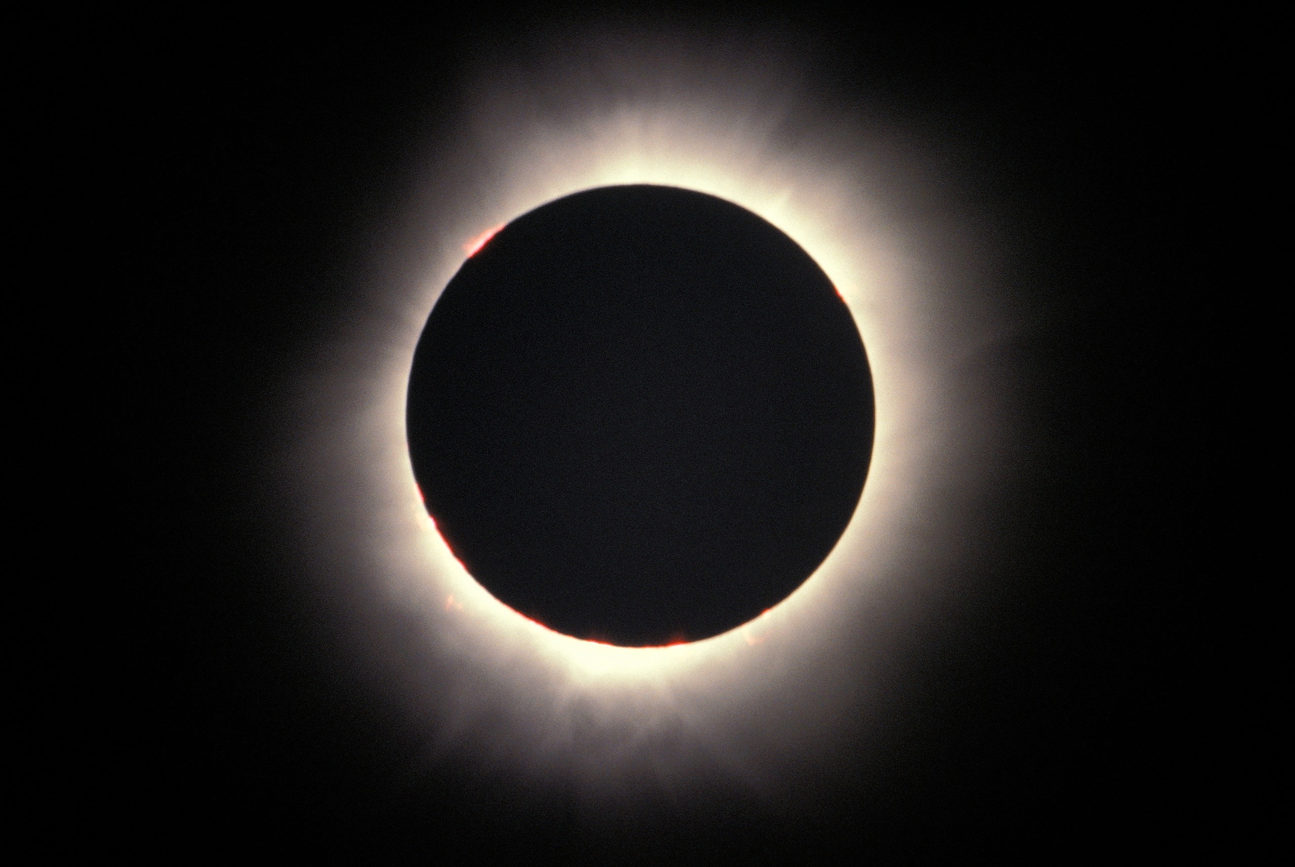 From cold, clear skies over Riverton, Manitoba, Canada, planet Earth, the solar corona surrounds the silhouette of the New Moon in this telescopic snapshot of the total solar eclipse of February 26, 1979. Thirty eight years ago, it was the last total solar eclipse visible from the contiguous United States. The narrow path of totality ran through the northwestern states of Washington, Oregon, Idaho, Montana, and North Dakota before crossing into Canadian provinces Saskatchewan, Manitoba, Ontario and Quebec. Following the upcoming August 21, 2017 total solar eclipse crossing the U.S. from coast to coast, an annular solar eclipse will be seen in the continental United States on October 14, 2023, visible along a route from Northern California to Florida. Then, the next total solar eclipse to touch the continental U.S. will track across 13 states from from Texas to Maine on April 8, 2024.