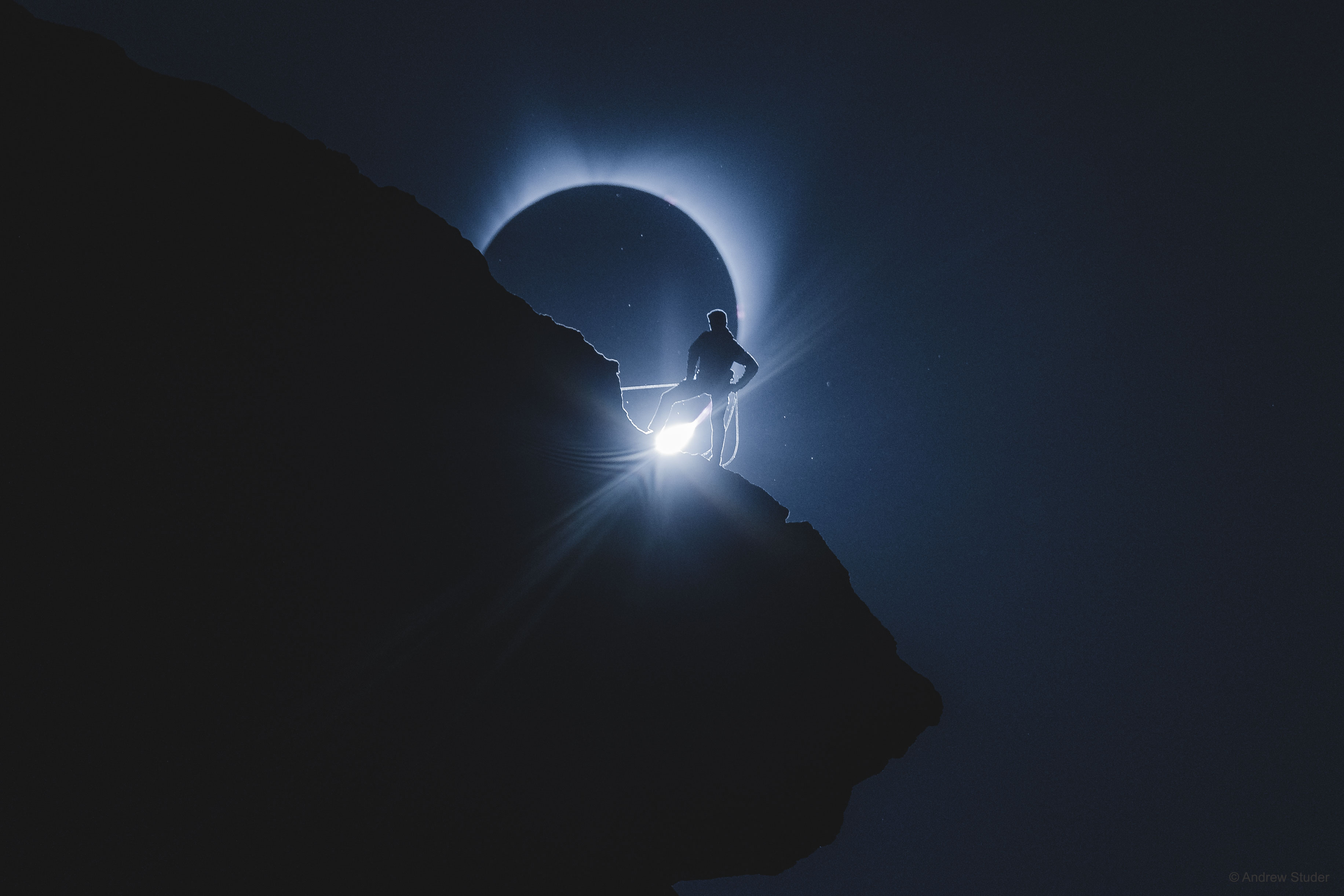What should you do if your rock climbing picture is photobombed by a total eclipse of the Sun?  Rejoice -- because your planning paid off. After months of considering different venues, and a week of scouting different locations in Oregon's Smith Rock State Park, a group of photographers and rock climbers led by Andrew Struder, Ted Hesser, Martina Tibell, and Michael Shainblum settled on picturesque 100-meter tall Monkey Face tower as the dramatic foreground for their images of the pending total solar eclipse.  Tension mounted as the eclipse time approached, planned juxtapositions were scrutinized, and the placement of rock climber Tommy Smith was adjusted. Right on schedule, though, the Moon moved in front of the Sun, and Smith moved in front of the Moon, just as planned. The solar eclipse image displayed here actually shows a diamond ring, an eclipse phase when a bit of the distant Sun is still visible beyond the Moon's surface.   Open Science: Browse 1,500+ codes in the Astrophysics Source Code Library