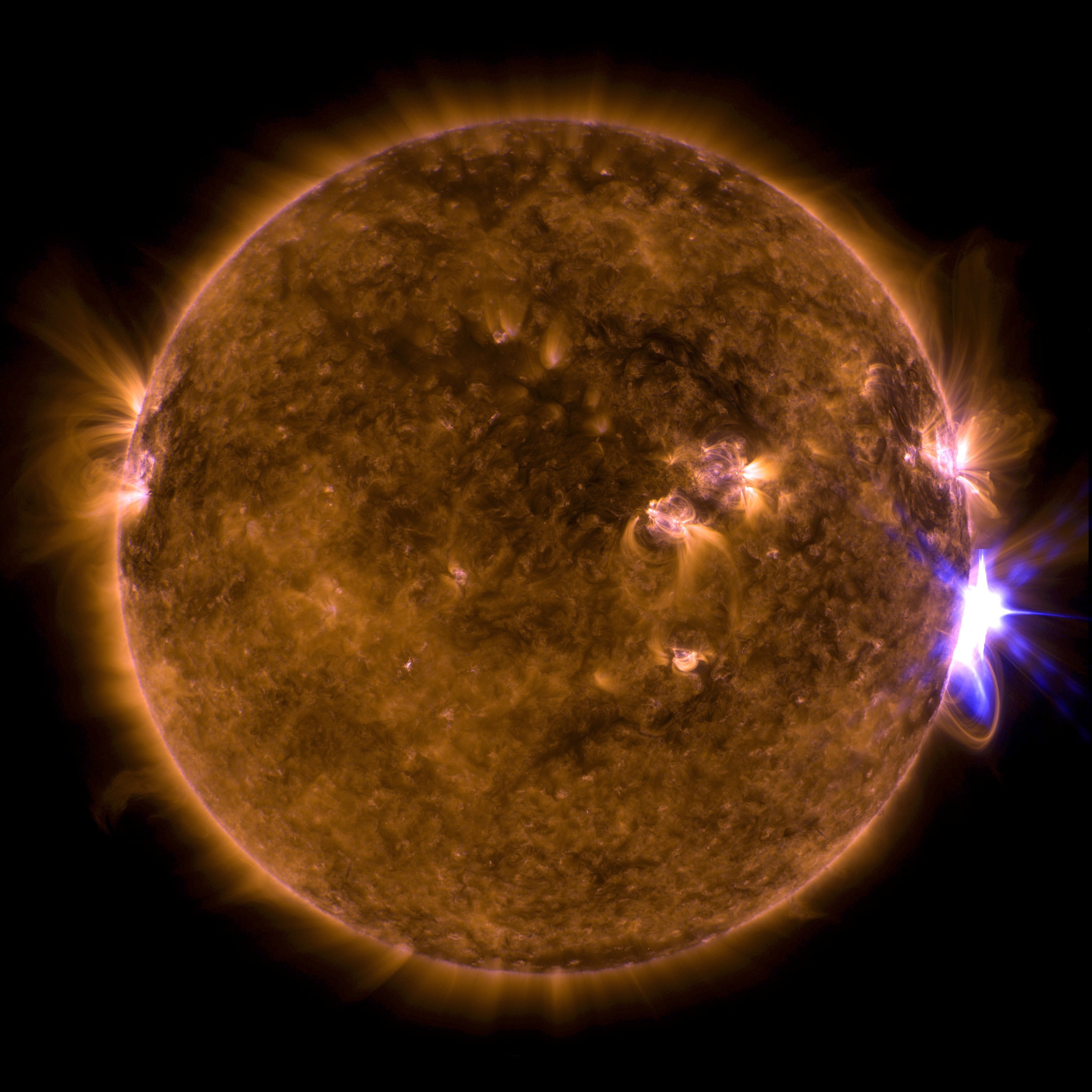 Almost out of view from our fair planet, rotating around the Sun's western edge giant active region AR2673 lashed out with another intense solar flare followed by a large coronal mass ejection on September 10. The flare itself is seen here at the right in an extreme ultraviolet image from the sun-staring Solar Dynamics Observatory. This intense flare was the fourth X-class flare from AR2673 this month. The active region's most recent associated coronal mass ejection collided with Earth's magnetosphere 2 days later. Say farewell to the mighty AR2673, for now. For the next two weeks, the powerful sunspot group will be on the Sun's far side.  Mission: Farewell Cassini