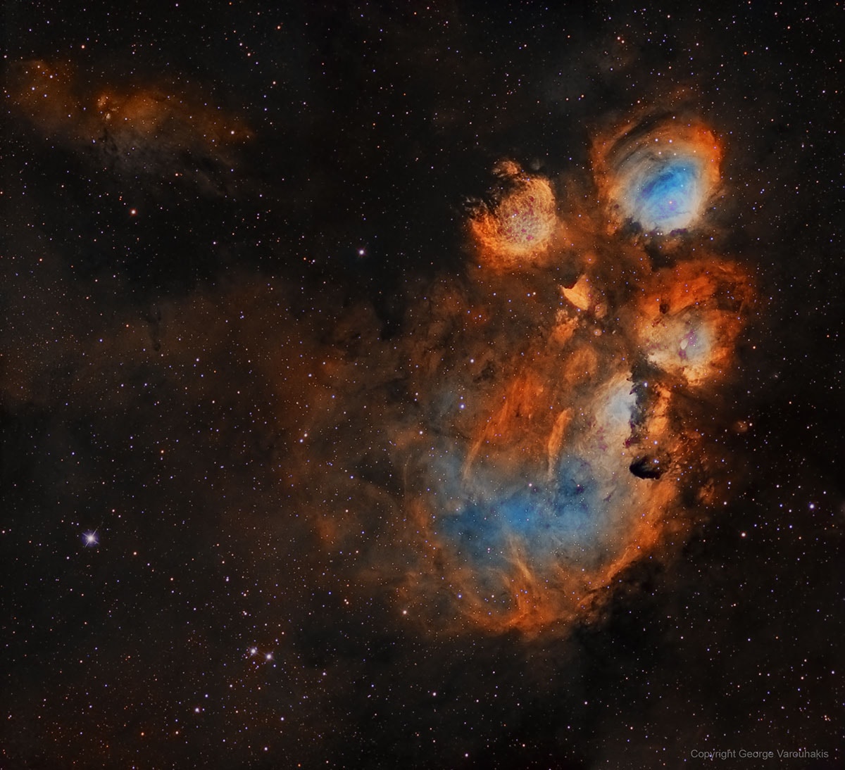 Nebulas are perhaps as famous for being identified with familiar shapes as perhaps cats are for getting into trouble.  Still, no known cat could have created the vast Cat's Paw Nebula visible in Scorpius.  At 5,500 light years distant, Cat's Paw is an emission nebula with a red color that originates from an abundance of ionized hydrogen atoms.  Alternatively known as the Bear Claw Nebula or NGC 6334, stars nearly ten times the mass of our Sun have been born there in only the past few million years. Pictured here is  a deep field image of the  Cat's Paw Nebula in light emitted by hydrogen, oxygen, and sulfur.