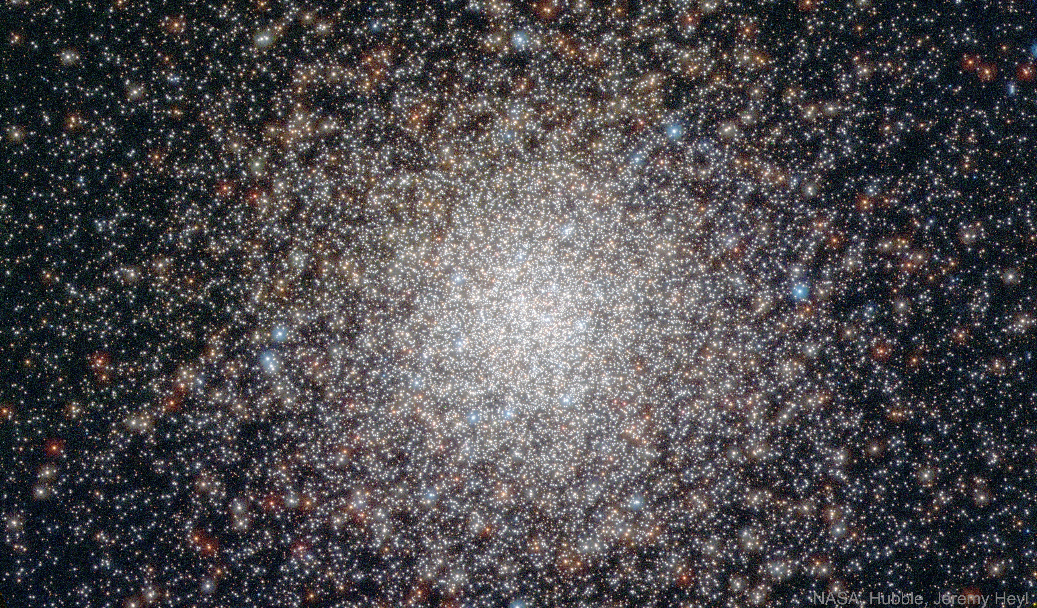 If our Sun were near the center of NGC 362, the night sky would glow like a jewel box of bright stars. Hundreds of stars would glow brighter than Sirius, and in many different colors. Although these stars could become part of breathtaking constellations and intricate folklore, it would be difficult for planetary inhabitants there to see -- and hence understand -- the greater universe beyond.  NGC 362 is one of only about 170 globular clusters of stars that exist in our Milky Way Galaxy. This star cluster is one of the younger globulars, forming likely well after our Galaxy.  NGC 362 can be found with the unaided eye nearly in front of the Small Magellanic Cloud, and angularly close to the second brightest globular cluster known, 47 Tucanae.  The featured image was taken with the Hubble Space Telescope to help better understand how massive stars end up near the center of some globular clusters.