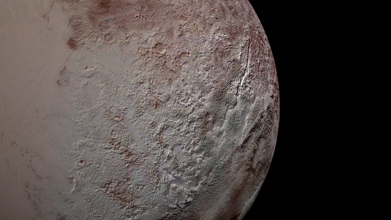 Imaged during the New Horizons spacecraft flyby in July 2015, Pluto's bladed terrain is captured in this close-up of the distant world. The bizarre texture belongs to fields of skyscraper-sized, jagged landforms made almost entirely of methane ice, found at extreme altitudes near Pluto's equator. Casting dramatic shadows, the tall, knife-like ridges seem to have been formed by sublimation. By that process, condensed methane ice turns directly to methane gas without passing through a liquid phase during Pluto's warmer geological periods. On planet Earth, sublimation can also produce standing fields of knife-like ice sheets, found along the high plateau of the Andes mountain range. Known as penitentes, those bladed structures are made of water ice and at most a few meters tall.