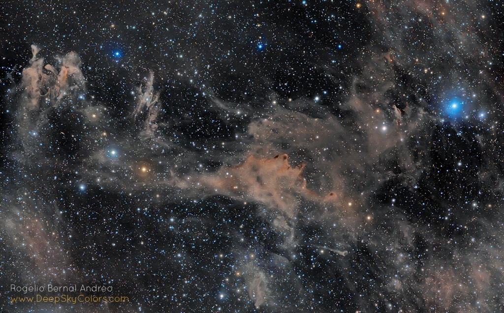This composition in stardust covers over 8 degrees on the northern sky. The mosaicked field of view is west of the familiar Pleiades star cluster, toward the zodiacal constellation Aries and the plane of our Milky Way Galaxy. At right in the deep skyscape is bluish Epsilon Arietis, a star visible to the naked-eye and about 330 light-years away. Reflecting starlight in the region, dusty nebulae LBN762, LBN753, and LBN743 sprawl left to right across the field, but are likely some 1,000 light-years away. At that estimated distance, the cosmic canvas is over 140 light-years across. Near the edge of a large molecular cloud, their dark interiors can hide newly formed stars and young stellar objects or protostars from prying optical telescopes. Collapsing due to self-gravity, the protostars form around dense cores embedded in the molecular cloud.