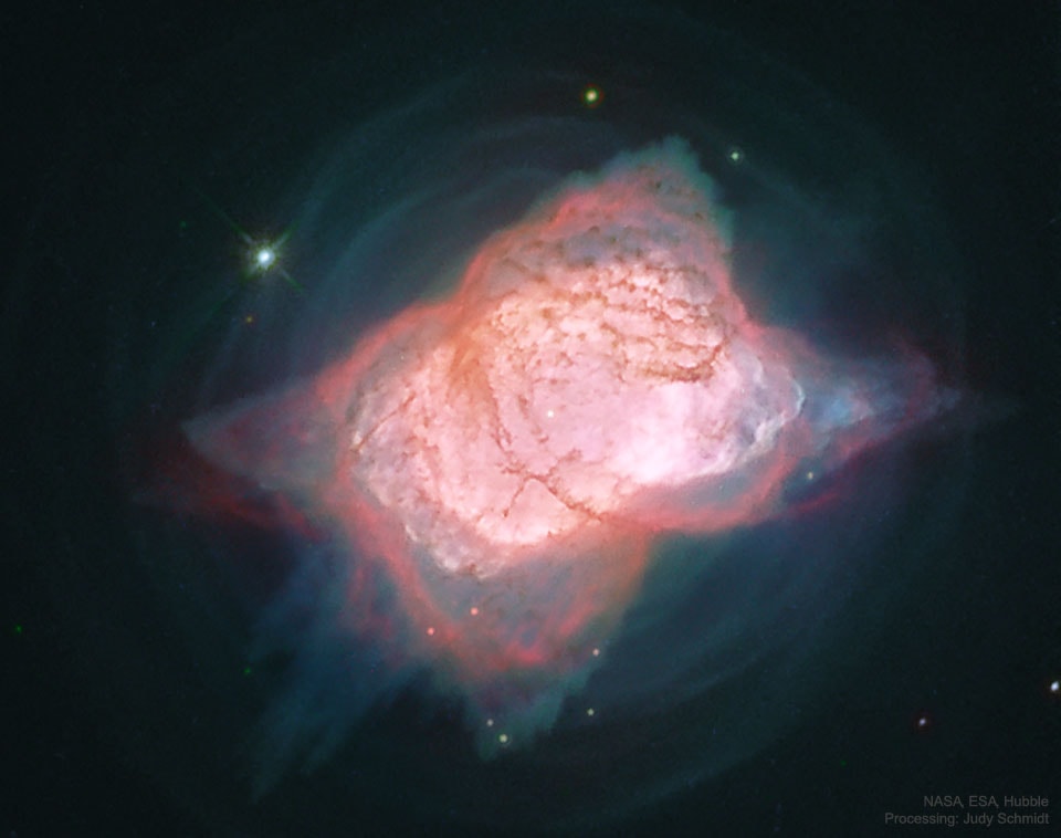It is one of the brightest planetary nebulae on the sky -- what should it be named? First discovered in 1878, nebula NGC 7027 can be seen toward the constellation of the Swan (Cygnus) with a standard backyard telescope. Partly because it appears there as only an indistinct spot, it is rarely referred to with a moniker. When imaged with the Earth-orbiting Hubble Space Telescope, however, great details are revealed. Studying Hubble images of NGC 7027 have led to the understanding that it is a planetary nebula that began expanding about 600 years ago, and that the cloud of gas and dust is unusually massive as it appears to contain about three times the mass of our Sun. Pictured here in assigned colors, the resolved, layered, and dust-laced features of NGC 7027 might remind sky enthusiasts of a familiar icon that could be the basis for an informal name. A leading previous suggestion was the Pillow Nebula, but please feel free to make new suggestions -- for example, in an online APOD discussion forum.   Free APOD Lecture Tonight near Washington, DC: Starting at 7 pm at the National Harbor