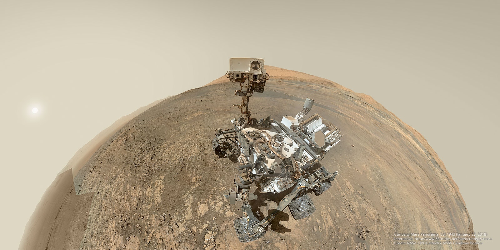 On sol 1943 of its journey of exploration across the surface of Mars, the Curiosity Rover recorded this selfie at the south rim of Vera Rubin Ridge. Of course a sol is a Martian solar day, about 40 minutes longer than an Earth day. Curiosity's sol 1943 corresponds to Earth date January 23, 2018. Also composed as an interactive 360 degree VR, the mosaicked panorama combines 61 exposures taken by the car-sized rover's Mars Hand Lens Imager (MAHLI). Frames containing the imager's arm have been edited out while the extended background used was taken by the rover's Mastcam on sol 1903. At the top of the rover's mast, sitting above the Mastcam, the laser-firing ChemCam housing blocks out the distant peak of Mount Sharp.
