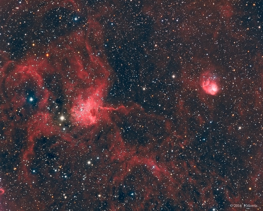 Will the spider ever catch the fly? Not if both are large emission nebulas toward the constellation of the Charioteer (Auriga).  The spider-shaped gas cloud on the left is actually an emission nebula labelled IC 417, while the smaller fly-shaped cloud on the right is dubbed  NGC 1931 and is both an emission nebula and a reflection nebula.  About 10,000 light-years distant, both nebulas harbor young, open star clusters. For scale, the more compact NGC 1931 (Fly) is about 10 light-years across.