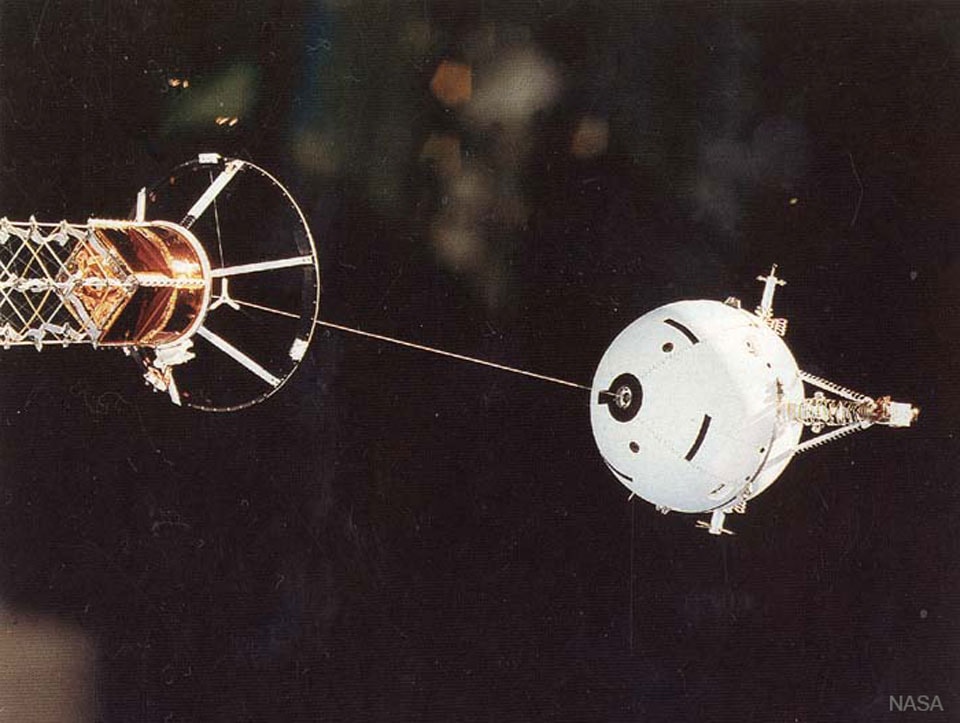 One of the greatest unrequited legends of outer space is the tether.  Tethers, long strands of material, hold the promise of stabilizing satellites, generating electricity, and allowing easy transportation.  Possibly the most ambitious vision of the space tether is the space elevator popularized by Arthur C. Clarke, where a tether is constructed that connects the ground to geosynchronous orbit.  One problem is strength - it is difficult to make a long useful tether that does not snap.  Pictured here is the deployment of the Tethered Satellite System 1 (TSS-1) by the space shuttle Altantis in 1992.  Like other tested tethers, TSS-1 failed to live up to its promise, although many valuable lessons were learned.   Free APOD Lecture: January 9 in DC