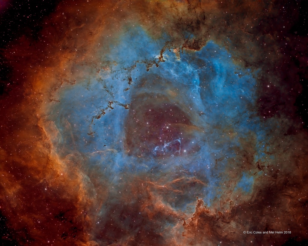 Not all roses are red of course, but they can still be very pretty. Likewise, the beautiful Rosette Nebula and other star forming regions are often shown in astronomical images with a predominately red hue, in part because the dominant emission in the nebula is from hydrogen atoms. Hydrogen's strongest optical emission line, known as H-alpha, is in the red region of the spectrum, but the beauty of an emission nebula need not be appreciated in red light alone. Other atoms in the nebula are also excited by energetic starlight and produce narrow emission lines as well. In this gorgeous view of the Rosette Nebula, narrowband images are combined to show emission from sulfur atoms in red, hydrogen in blue, and oxygen in green. In fact, the scheme of mapping these narrow atomic emission lines into broader colors is adopted in many Hubble images of stellar nurseries. The image spans about 100 light-years in the constellation Monoceros, at the 3,000 light-year estimated distance of the Rosette Nebula. To make the Rosette red, just follow this link or slide your cursor over the image.