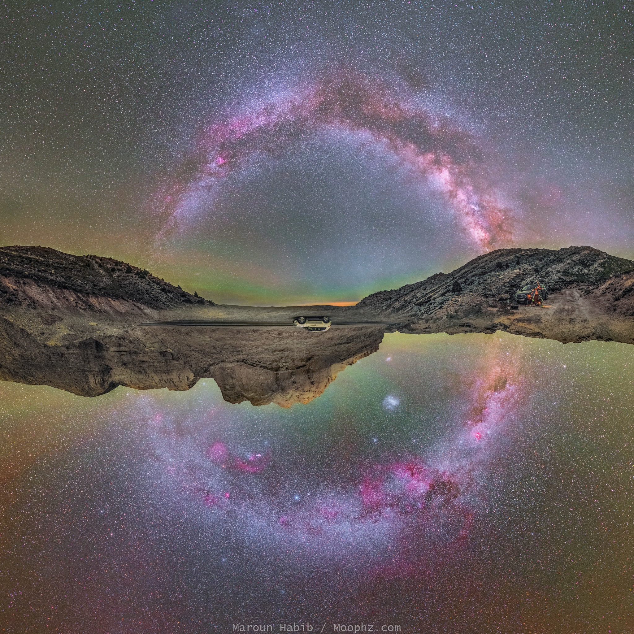 Is it possible to capture the entire plane of our galaxy in a single image? Yes, but not in one exposure -- and it took some planning to do it in two. The top part of the featured image is the night sky above Lebanon, north of the equator, taken in 2017 June. The image was taken at a time when the central band of the Milky Way Galaxy passed directly overhead. The bottom half was similarly captured six months later in latitude-opposite Chile, south of Earth's equator. Each image therefore captured the night sky in exactly the opposite direction of the other, when fully half the Galactic plane was visible. The southern half was then inverted -- car and all -- and digitally appended to the top half to show the entire central band of our Galaxy, as a circle, in a single image.  Many stars and nebulas are visible, with the Large Magellanic Cloud being particularly notable inside the lower half of the complete galactic circle.