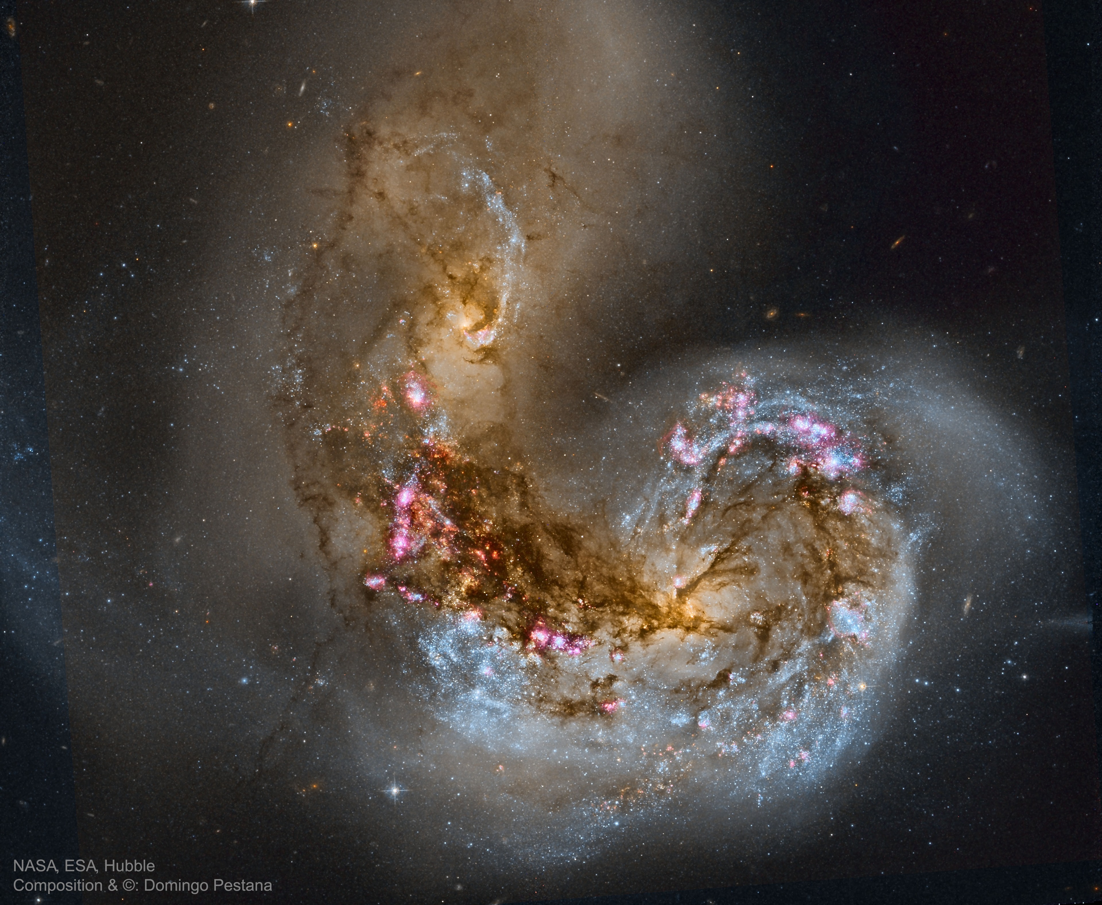 This galaxy is having a bad millennium.  In fact, the past 100 million years haven't been so good, and probably the next billion or so will be quite tumultuous.  Visible toward the lower right, NGC 4038 used to be a normal spiral galaxy, minding its own business, until NGC 4039, to its upper left, crashed into it.  The evolving wreckage, known famously as the Antennae, is featured here.  As gravity restructures each galaxy, clouds of gas slam into each other, bright blue knots of stars form, massive stars form and explode, and brown filaments of dust are strewn about.  Eventually the two galaxies will converge into one larger spiral galaxy. Such collisions are not unusual, and even our own Milky Way Galaxy has undergone several in the past and is predicted to collide with our neighboring Andromeda Galaxy in a few billion years. The frames that compose this image were taken by the orbiting Hubble Space Telescope by professional astronomers to better understand galaxy collisions. These frames -- and many other deep space images from Hubble -- have since been made public, allowing interested amateurs to download and process them into, for example, this visually stunning composite.