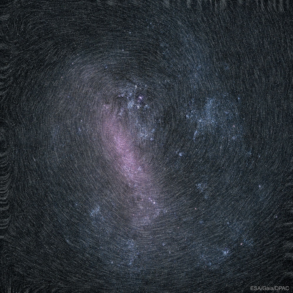 This image is not blurry. It shows in clear detail that the largest satellite galaxy to our Milky Way, the Large Cloud of Magellan (LMC), rotates.  First determined with Hubble, the rotation of the LMC is presented here with fine data from the Sun-orbiting Gaia satellite. Gaia measures the positions of stars so accurately that subsequent measurements can reveal slight proper motions of stars not previously detectable.  The featured image shows, effectively, exaggerated star trails for millions of faint LMC stars.  Inspection of the image also shows the center of the clockwise rotation: near the top of the LMC's central bar.  The LMC, prominent in southern skies, is a small spiral galaxy that has been distorted by encounters with the greater Milky Way Galaxy and the lesser Small Magellanic Cloud (SMC).   Open Science: Browse 1,600+ codes in the Astrophysics Source Code Library