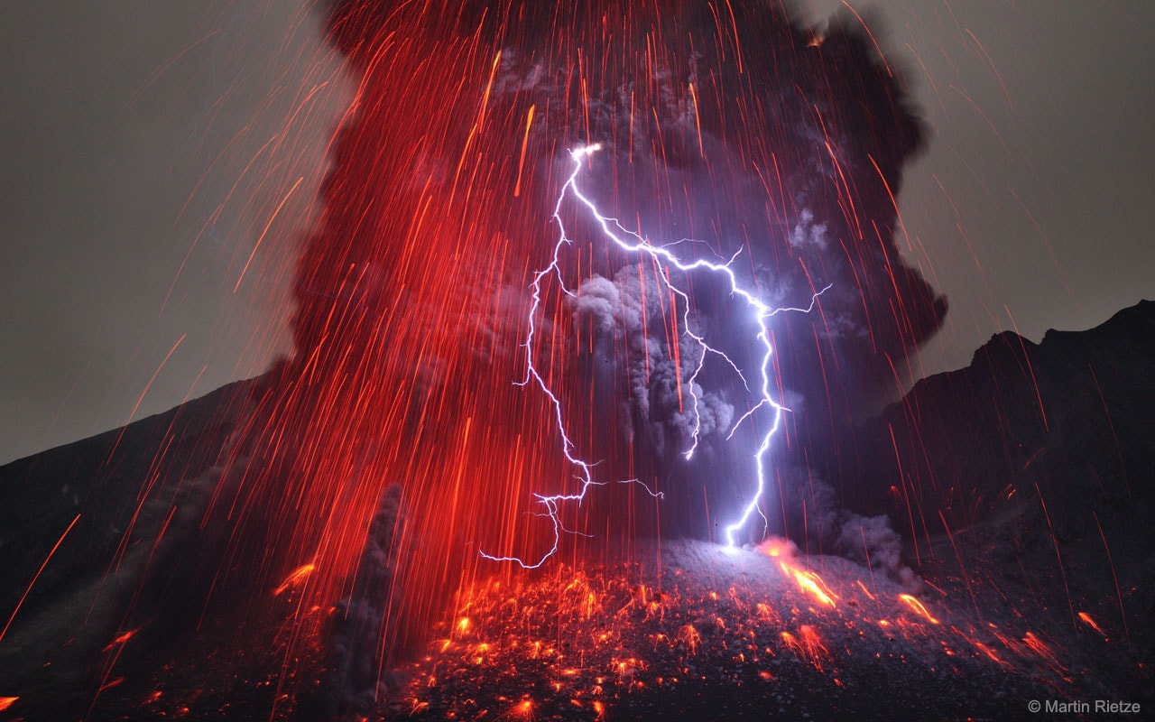 Why does a volcanic eruption sometimes create lightning? Pictured above, the Sakurajima volcano in southern Japan was caught erupting in 2013 January. Magma bubbles so hot they glowed shot away as liquid rock burst through the Earth's surface from below.  The featured image is particularly notable, however, for the lightning bolts caught near the volcano's summit.  Why lightning occurs even in common thunderstorms remains a topic of research, and the cause of volcanic lightning is even less clear. Surely, lightning bolts help quench areas of opposite but separated electric charges. Volcanic lightning episodes may be facilitated by charge-inducing collisions in volcanic dust. Lightning is usually occurring somewhere on Earth, typically over 40 times each second.    Follow APOD on: Facebook,  Google Plus,  Instagram, or Twitter