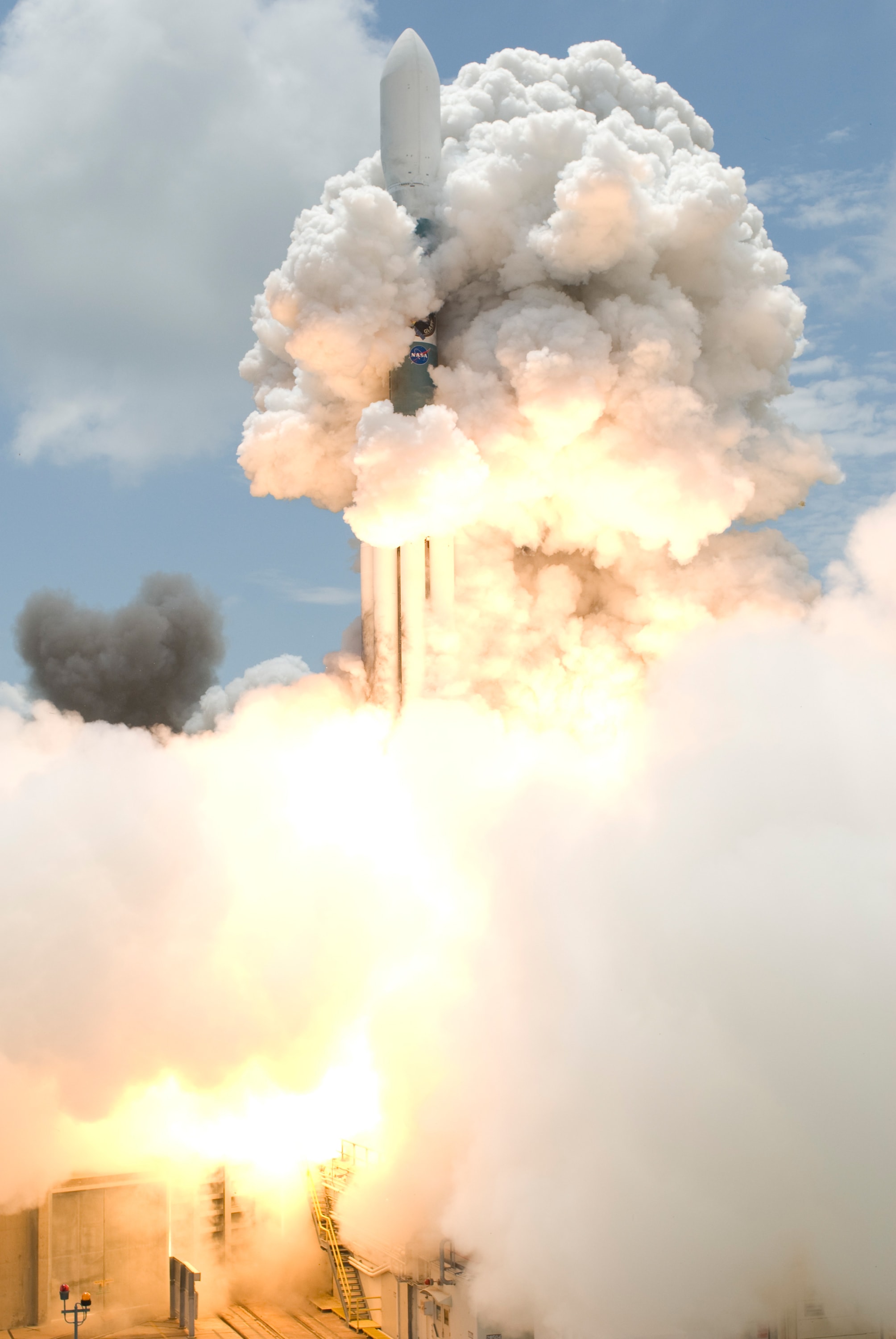 Rising through a billowing cloud of smoke, a long time ago from a planet very very close by, this Delta II rocket left Cape Canaveral Air Force Station's launch pad 17-B at 12:05 pm EDT on June 11, 2008. Snug in the payload section was GLAST, the Gamma-ray Large Area Space Telescope. GLAST's detector technology was developed for use in terrestrial particle accelerators. So from orbit, GLAST can detect gamma-rays from extreme environments above the Earth and across the distant Universe, including supermassive black holes at the centers of distant active galaxies, and the sources of powerful gamma-ray bursts. Those formidable cosmic accelerators achieve energies not attainable in earthbound laboratories. Now known as the Fermi Gamma-ray Space Telescope, on the 10 year anniversary of its launch, let the Fermi Science Playoffs begin.