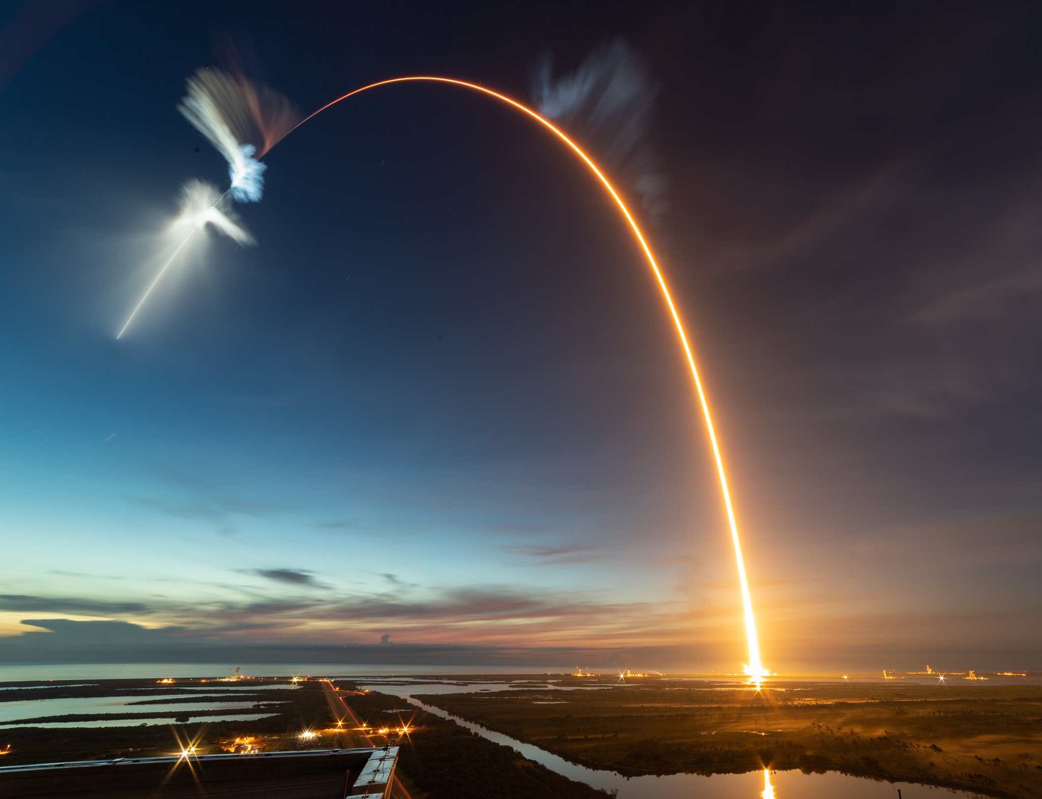 If you saw the dawn's early light from Cape Canaveral Air Force Station last Friday, June 29, then you could have seen this rocket's red glare. The single 277-second long exposure, made from the roof of NASA's Vehicle Assembly building, shows a predawn Falcon 9 launch, the rocket streaking eastward into the sky about 45 minutes before sunrise. At high altitude, its stage separation plume is brightly lit by the Sun still below the eastern horizon. The Falcon 9 rocket's first stage had been launched before, lofting the Transiting Exoplanet Survey Satellite (TESS) into orbit on April 18, only 72 days earlier. For this launch of SpaceX Commercial Resupply Service mission 15 (CRS-15) it carried an also previously flown Dragon capsule. But no further reuse of this Falcon 9 was planned so no dramatic first stage landing followed the launch. The Dragon capsule arrived at the International Space Station on July 2.