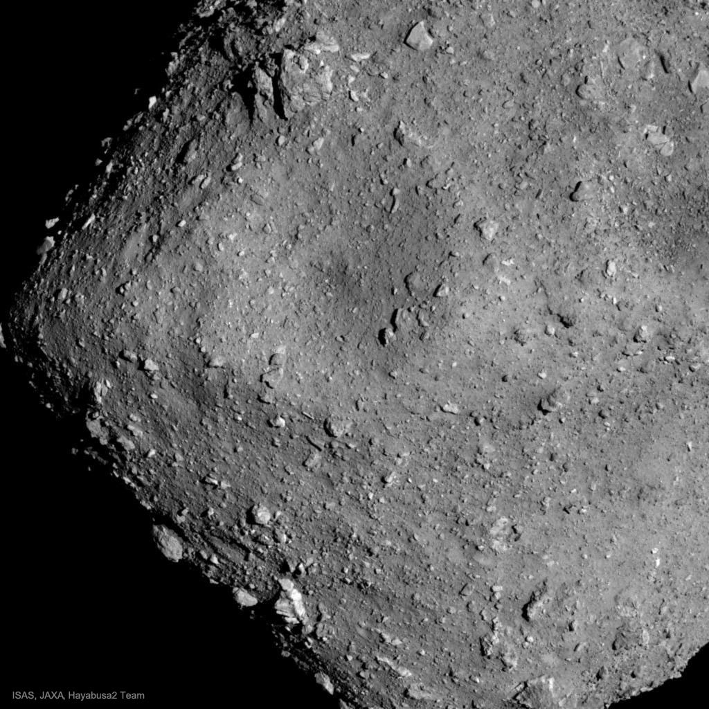 This big space diamond has an estimated value of over 80 billion dollars. It's only diamond in shape, though -- asteroid 162173 Ryugu is thought to be composed of mostly nickel and iron.  Asteroids like Ryugu are interesting for several reasons, perhaps foremost because they are near the Earth and might, one day in the far future, pose an impact threat. In the nearer term, Ryugu is interesting because it may be possible to send future spacecraft there to mine it, thus providing humanity with a new source of valuable metals.  Scientifically, Ryugu is interesting because it carries information about how our Solar System formed billions of years ago, and why its orbit takes it so close to Earth. Japan's robotic spacecraft Hayabusa2 just arrived at this one-kilometer wide asteroid in late June. The featured image shows surface structures unknown before spacecraft Hayabusa2's arrival, including rock fields and craters.  Within the next three months, Hayabusa2 is scheduled to unleash several probes, some that will land on Ryugu and hop around, while Hayabusa2 itself will mine just a little bit of the asteroid for return to Earth.