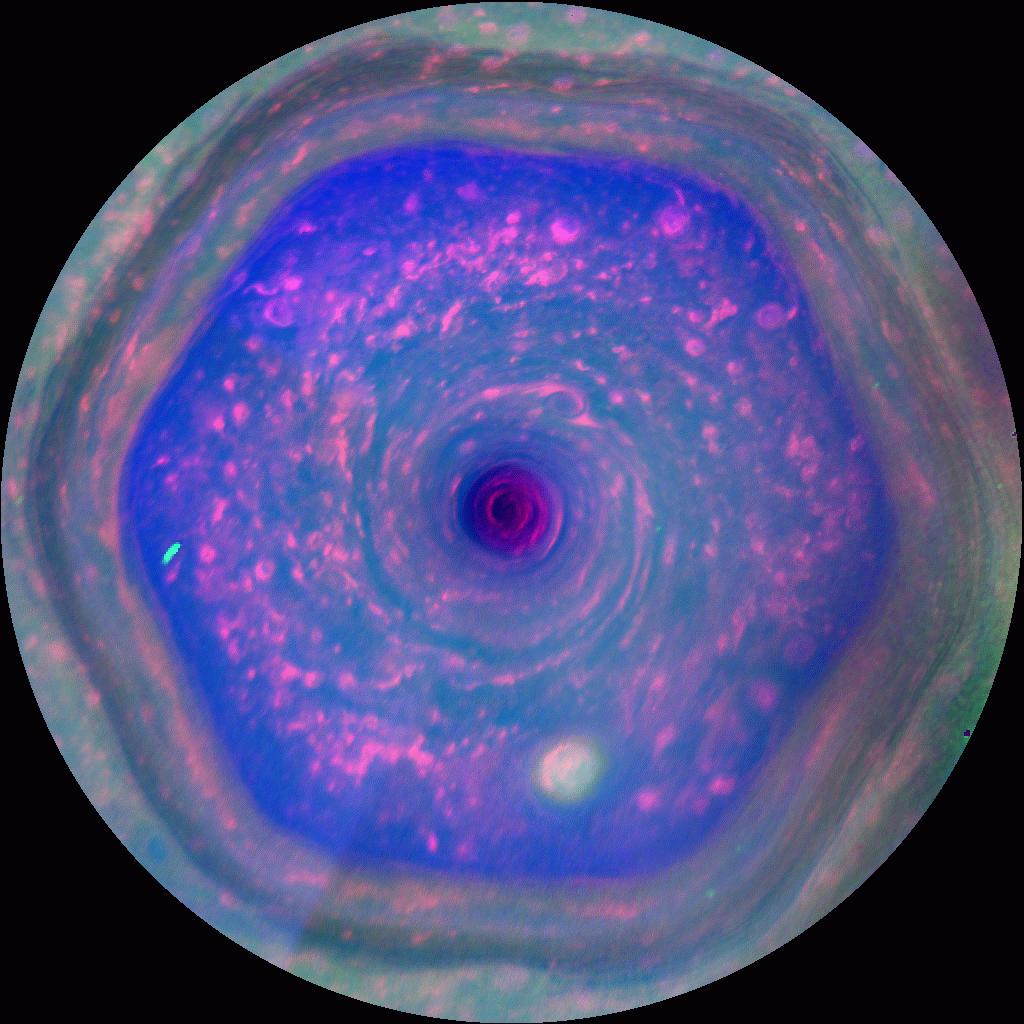 In full view, the amazing six-sided jet stream known as Saturn's north polar hexagon is shown in this colorful Cassini image. Extending to 70 degrees north latitude, the false-color video frame is map-projected, based on infrared, visible, and ultraviolet image data recorded by the Saturn-orbiting spacecraft in late 2012. First found in the outbound Voyager flyby images from the 1980s, the bizarre, long-lived feature tied to the planet's rotation is about 30,000 kilometers across. At its center lies the ringed gas giant's hurricane-like north polar storm. A new long term study of Cassini data has found a remarkable higher-altitude vortex, exactly matching the outlines of the north polar hexagon, that formed as summer approached the planet's northern hemisphere. It appears to reach hundreds of kilometers above these deeper cloud tops, into Saturn's stratosphere.