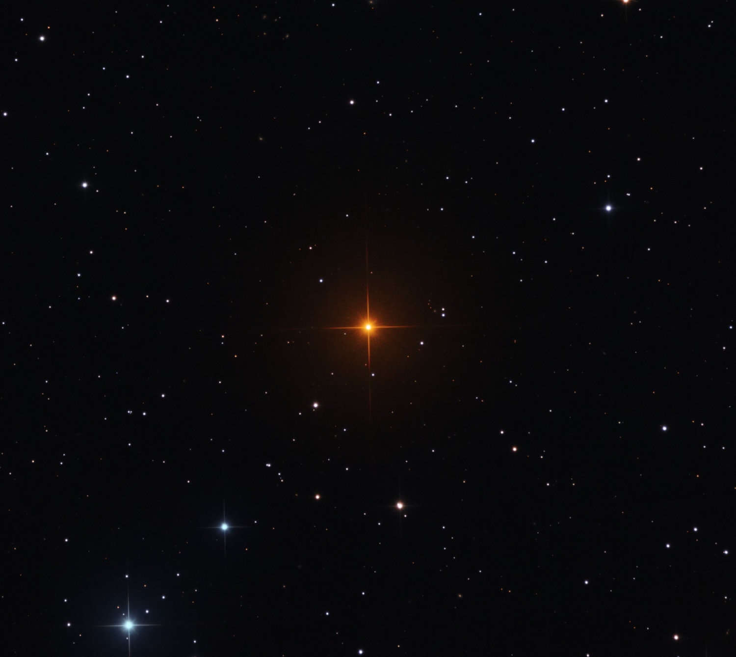 Better known as Hind's Crimson Star, R Leporis is a rare star in planet Earth's night sky. It's also a shocking shade of red. The star's discoverer, 19th century English astronomer John Russell Hind, reported that it appeared in a telescope "... like a drop of blood on a black field." Located 1,360 light-years away in the constellation Lepus the star is a Mira-type variable, changing its brightness over a period of about 14 months. R Leporis is now recognized as a carbon star, a very cool and highly evolved red giant with an extreme abundance of carbon. Extra carbon in carbon stars is created by helium fusion near the dying stellar core and dredged up into the stars' outer layers. The dredge-up results in an overabundance of simple carbon molecules, like CO, CH, CN, and C2. While it's true that cool stars radiate most of their energy in red and infrared light, the carbon molecules strongly absorb what little blue light is left and give carbon stars an exceptionally deep red color.  R Leporis is losing its carbon-rich atmosphere into the surrounding interstellar material through a strong stellar wind though, and could be near the transition to a planetary nebula. Oh, and Happy Halloween from the folks at APOD.