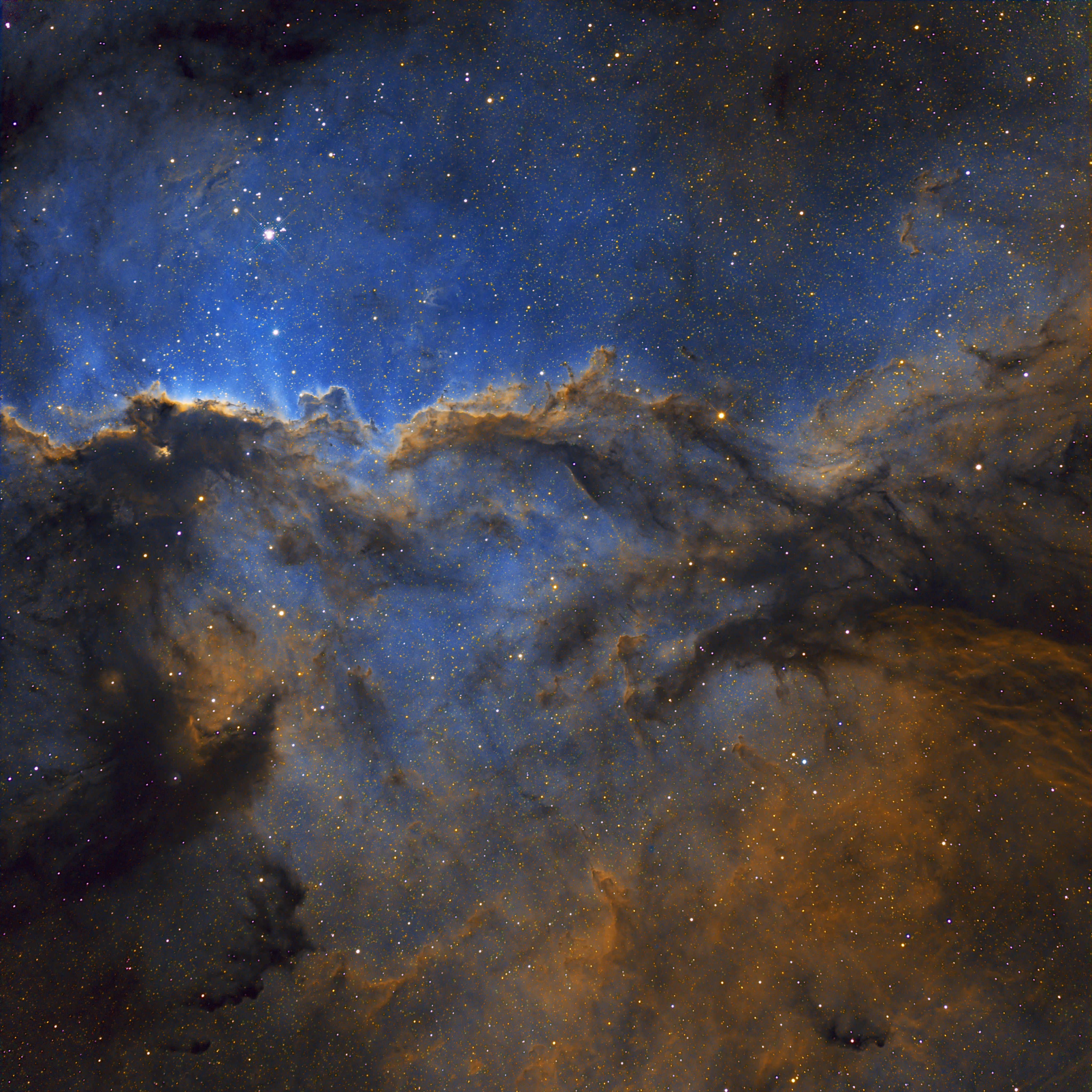 Dark shapes with bright edges winging their way through dusty NGC 6188 are tens of light-years long. The emission nebula is found near the edge of an otherwise dark large molecular cloud in the southern constellation Ara, about 4,000 light-years away. Born in that region only a few million years ago, the massive young stars of the embedded Ara OB1 association sculpt the fantastic shapes and power the nebular glow with stellar winds and intense ultraviolet radiation. The recent star formation itself was likely triggered by winds and supernova explosions, from previous generations of massive stars, that swept up and compressed the molecular gas. With image data from the Chilescope Observatory, a false-color Hubble palette was used to create this gorgeous wide-field image and shows emission from sulfur, hydrogen, and oxygen atoms in red, green, and blue hues. The field of view spans about four full Moons, corresponding to about 150 light years at the estimated distance of NGC 6188.