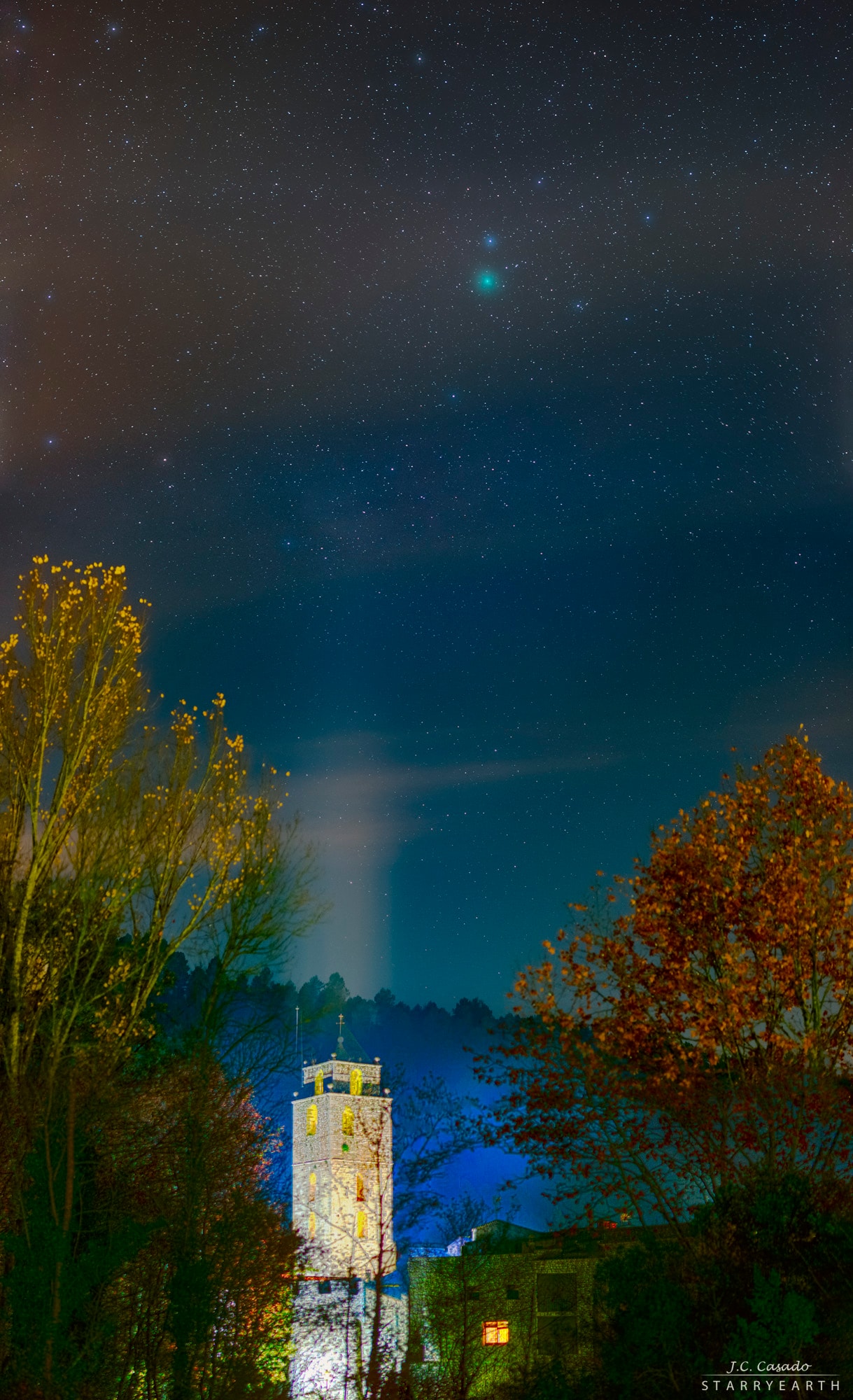 Coming close in mid-December, Comet 46P Wirtanen hangs in this starry sky over the bell tower of a Romanesque church. In the constructed vertical panorama, a series of digital exposures capture its greenish coma on December 3 from Sant Llorenc de la Muga, Girona, Catalonia, Spain, planet Earth. With an orbital period that is now about 5.4 years, the periodic comet's perihelion, its closest approach, to the Sun will be on December 12. On December 16 it will be closest to Earth, passing at a distance of about 11.6 million kilometers or 39 light-seconds. That's close for a comet, a mere 30 times the Earth-Moon distance. A good binocular target for comet watchers, Wirtanen could be visible to the unaided eye from a dark sky site. To spot it after dusk on December 16, look close on the sky to the Pleiades star cluster in Taurus.