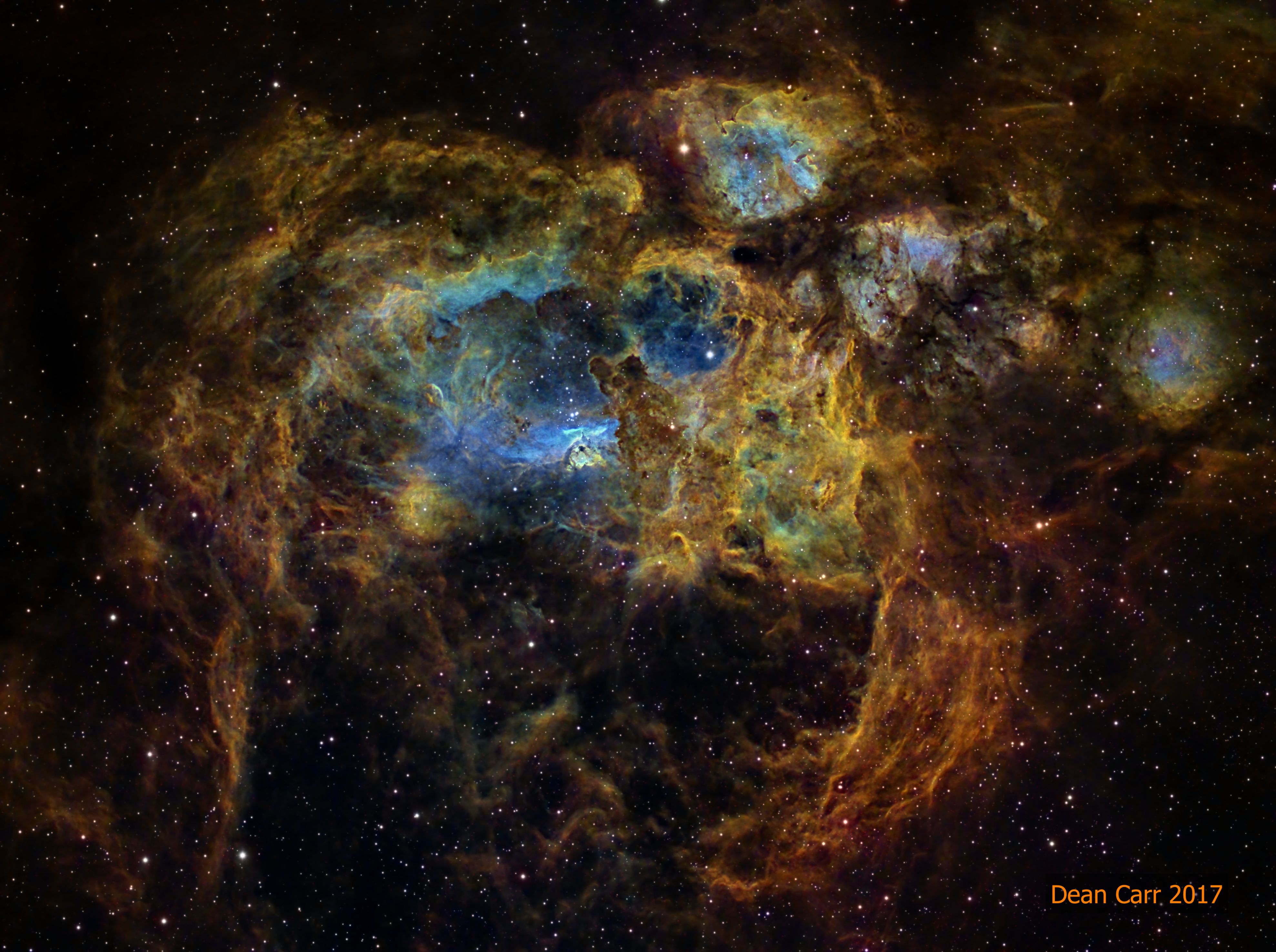 Why is the Lobster Nebula forming some of the most massive stars known? No one is yet sure.  Cataloged as NGC 6357, the Lobster Nebula houses the open star cluster Pismis 24 near its center -- a home to unusually bright and massive stars.  The overall blue glow near the inner star forming region results from the emission of ionized hydrogen gas.   The surrounding nebula, featured here, holds a complex tapestry of gas, dark dust, stars still forming, and newly born stars.  The intricate patterns are caused by complex interactions between interstellar winds, radiation pressures, magnetic fields, and gravity.  NGC 6357 spans about 400 light years and lies about 8,000 light years away toward the constellation of the Scorpion.   Free Download: 2019 APOD Calendar (v5)