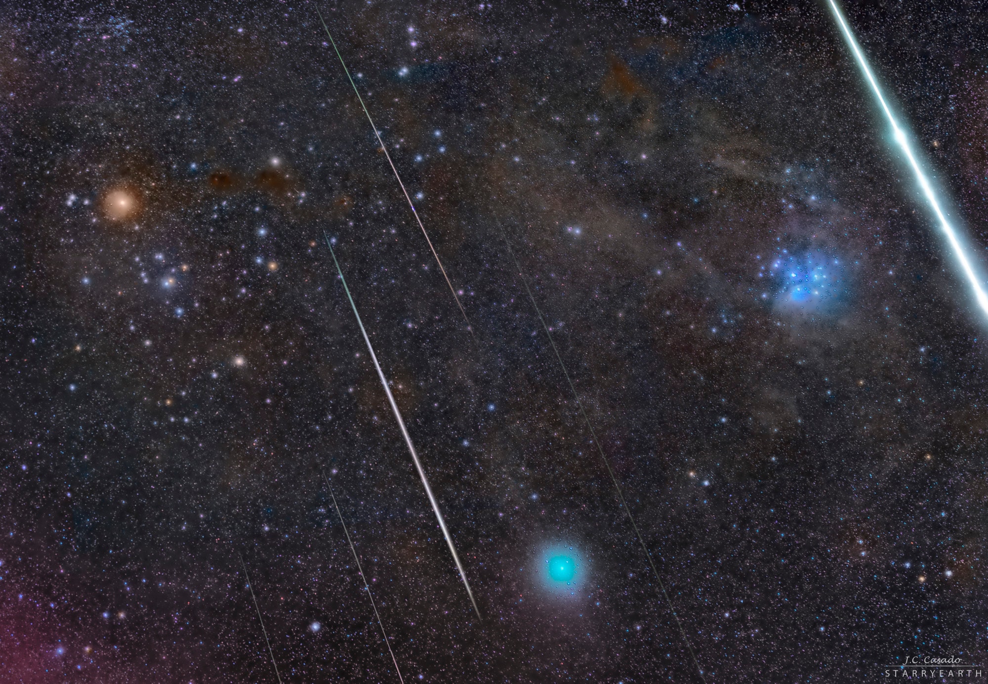 This was an unusual night to look in the direction of the Bull. The constellation Taurus is always well known for hosting two bright star clusters -- the Pleaides, visible on the right, and the comparatively diffuse Hyades, visible on the left.  This night last month, however, was atypically the peak of the Geminid meteor shower, and so several meteors were caught shooting through the constellation with parallel trails. More unusually still, Comet Wirtanen was drifting through the constellation, here appearing near the image bottom surrounded by a greenish coma. The comet was near its brightest as it sped past the Earth. The orange star on the upper left is Aldebaran, considered to be the eye of the Bull. Aldebaran is the brightest star in Taurus and the 15th brightest star in the sky.  The featured image is a combination of nearly 800 exposures taken from the Spanish village Albany�.    Follow APOD on: Instagram, Facebook,  Reddit, or Twitter