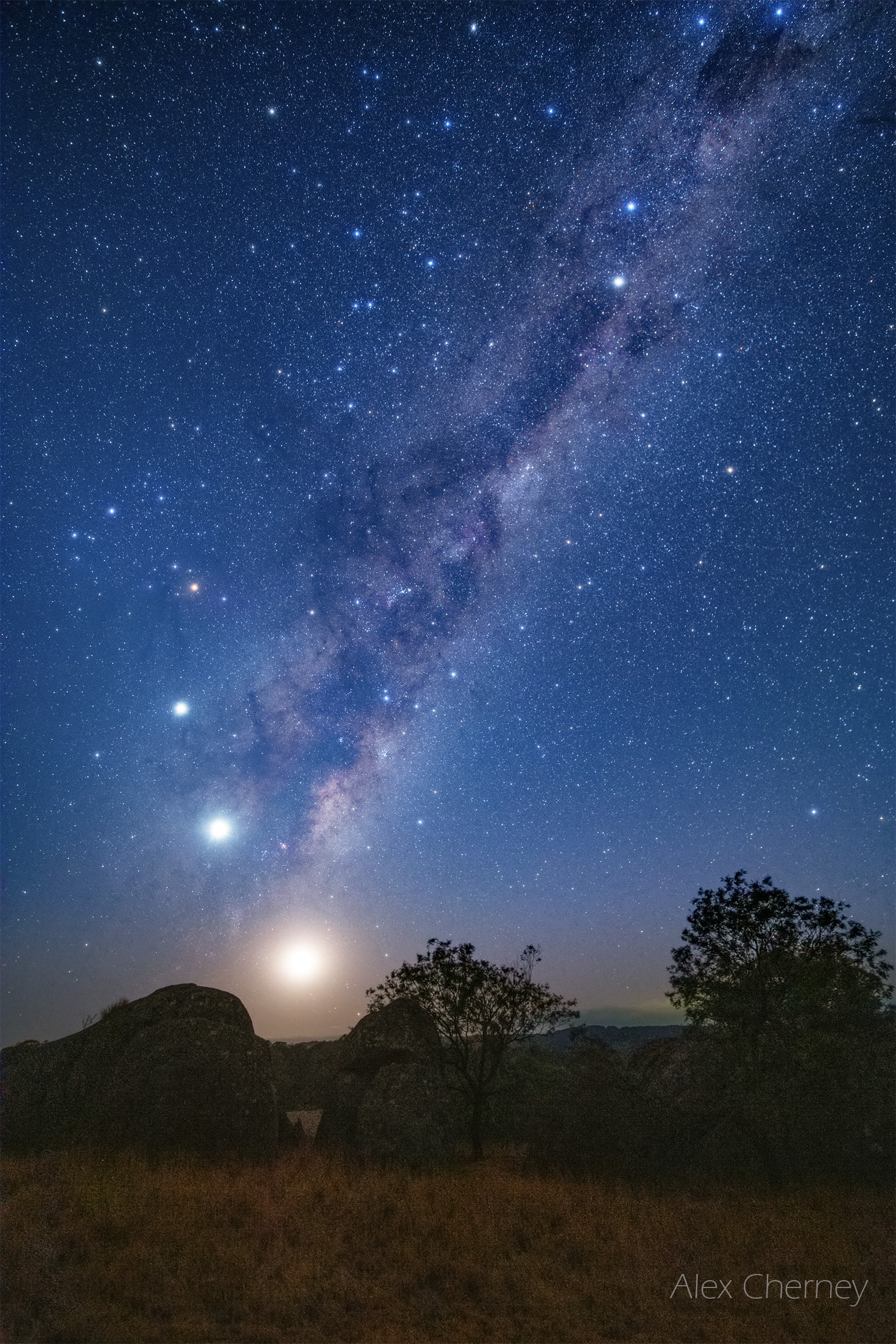 A luminous Milky Way falls toward the horizon in this deep skyscape, starting at the top of the frame from the stars of the Southern Cross and the dark Coalsack Nebula.  Captured in the dark predawn of February 2nd from Central Victoria, Australia, planet Earth, the 26 day old waning crescent Moon still shines brightly near the horizon. The second and third brightest celestial beacons are Venus and Jupiter along the lower part of the Milky Way's central bulge. Almost in line with the brighter planets and Moon, Saturn is the pinprick of light just visible below and right of the lunar glow. Australia's first astronomers saw the elongated, bulging shape of the familiar Milky Way as a great celestial Emu. The Moon and planets could almost be the Emu's eggs on this starry night.