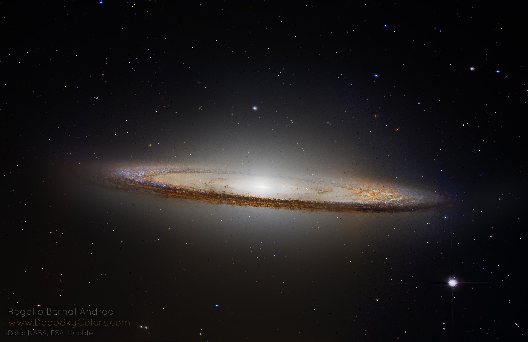 The striking spiral galaxy M104 is famous for its nearly edge-on profile featuring a broad ring of obscuring dust lanes. Seen in silhouette against an extensive central bulge of stars, the swath of cosmic dust lends a broad brimmed hat-like appearance to the galaxy suggesting a more popular moniker, The Sombrero Galaxy. Hubble Space Telescope data have been used to create this sharp view of the well-known galaxy. The processing results in a natural color appearance and preserves details often lost in overwhelming glare of M104's bright central bulge when viewed with smaller ground-based telescopes. Also known as NGC 4594, the Sombrero galaxy can be seen across the spectrum and is host to a central supermassive black hole. About 50,000 light-years across and 28 million light-years away, M104 is one of the largest galaxies at the southern edge of the Virgo Galaxy Cluster.