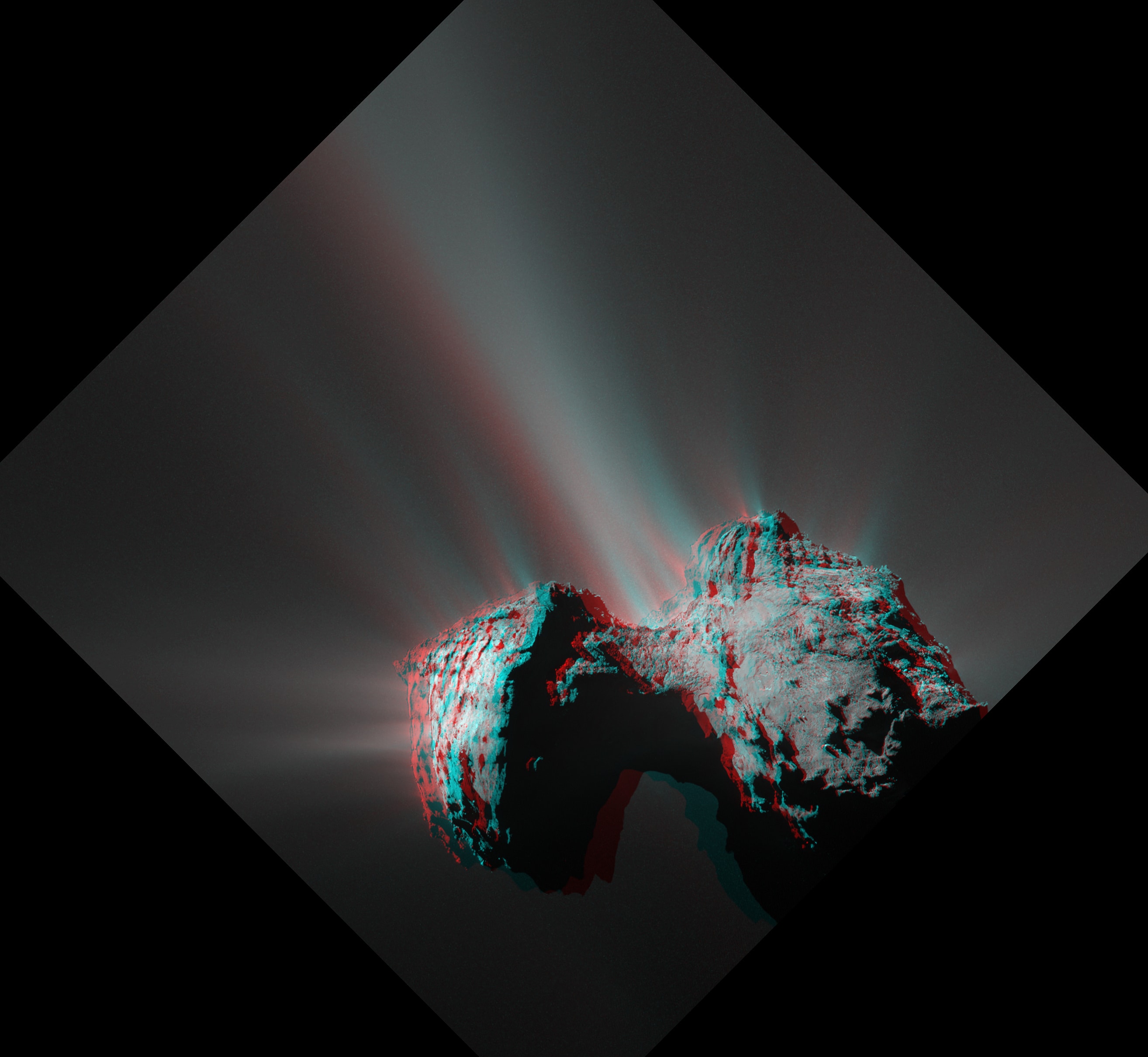 Put on your red/cyan glasses and float next to the jagged and double-lobed nucleus of Churyumov-Gerasimenko, also known as Comet 67P. The stereo anaglyph was created by combining two images from the Rosetta spacecraft's narrow angle OSIRIS camera taken on July 25, 2015 from a distance of 184 kilometers. Numerous jets are emanating from the small solar system world's active surface near its closest approach to the Sun. The larger lobe is around 4 kilometers in diameter, joined to a smaller, 2.5 kilometer diameter lobe by a narrow neck. Rosetta's mission to the comet ended in September 2016 when the spacecraft was commanded to a controlled impact with the comet's surface. Keep those 3D glasses on though. You can check out a new catalog of nearly 1400 stereo anaglyphs created from Rosetta image data on this website.