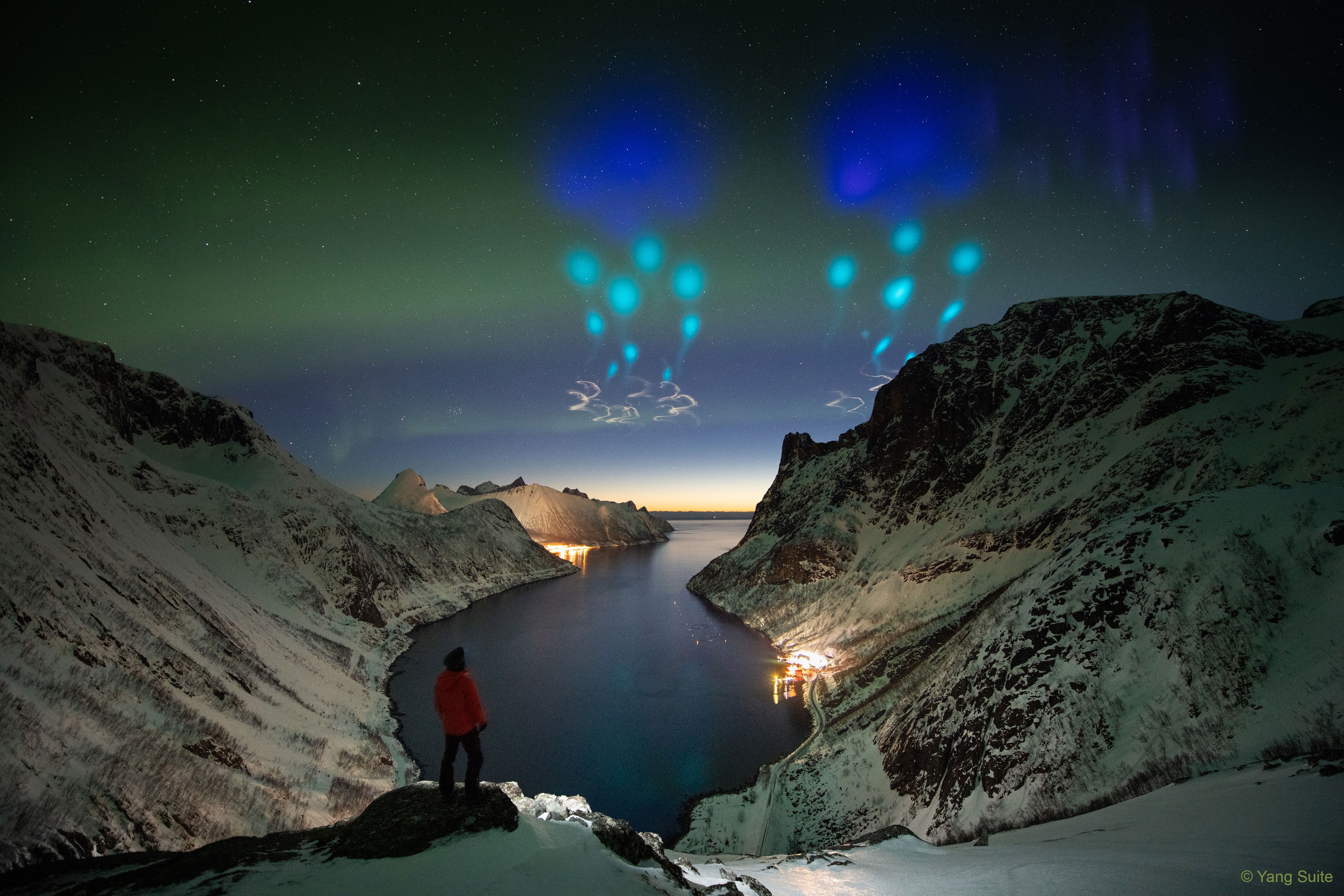 What's happening in the sky? The atmosphere over northern Norway appeared quite strange for about 30 minutes last Friday when colorful clouds, dots, and plumes suddenly appeared. The colors were actually created by the NASA-funded Auroral Zone Upwelling Rocket Experiment (AZURE) which dispersed gas tracers to probe winds in Earth's upper atmosphere. AZURE's tracers originated from two short-lived sounding rockets launched from the And�ya Space Center in Norway. The harmless gases, trimethylaluminum and a barium/strontium mixture, were released into the ionosphere at altitudes of 115 and 250 km.  The vapor trails were observed dispersing from several ground stations. Mapping how AZURE's vapors dispersed should increase humanity's understanding of how the solar wind transfers energy to the Earth and powers aurora.