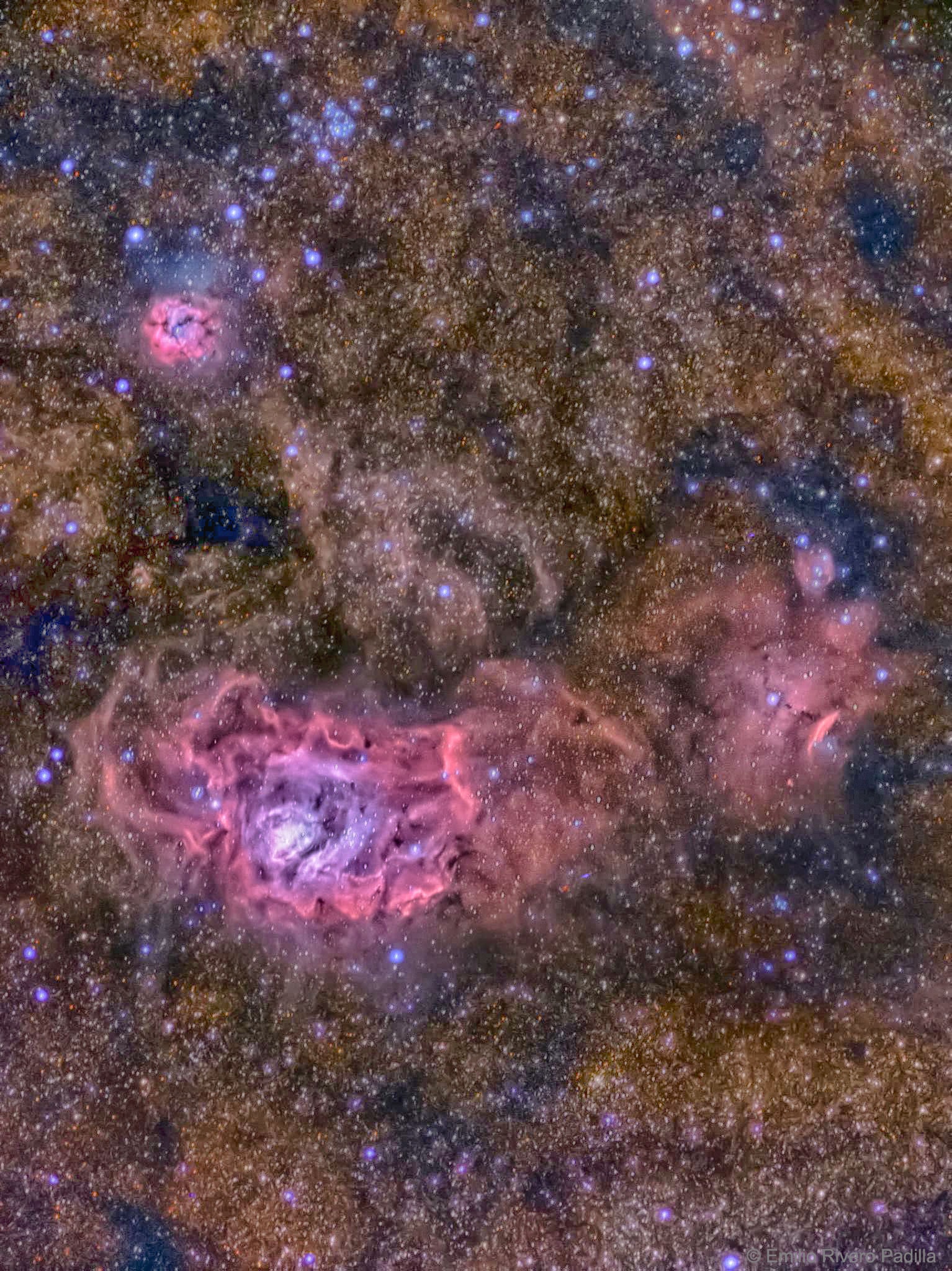 These three bright nebulae are often featured on telescopic tours of the constellation Sagittarius and the crowded starfields of the central Milky Way. In fact, 18th century cosmic tourist Charles Messier cataloged two of them; M8, the large nebula just left of center, and colorful M20 on the top left. The third emission region includes NGC 6559 and can be found to the right of M8. All three are stellar nurseries about five thousand light-years or so distant. Over a hundred light-years across, the expansive M8 is also known as the Lagoon Nebula. M20's popular moniker is the Trifid. Glowing hydrogen gas creates the dominant red color of the emission nebulae. In striking contrast, blue hues in the Trifid are due to dust reflected starlight. Recently formed bright blue stars are visible nearby.  The colorful composite skyscape was recorded in 2018 in Teide National Park in the Canary Islands, Spain.