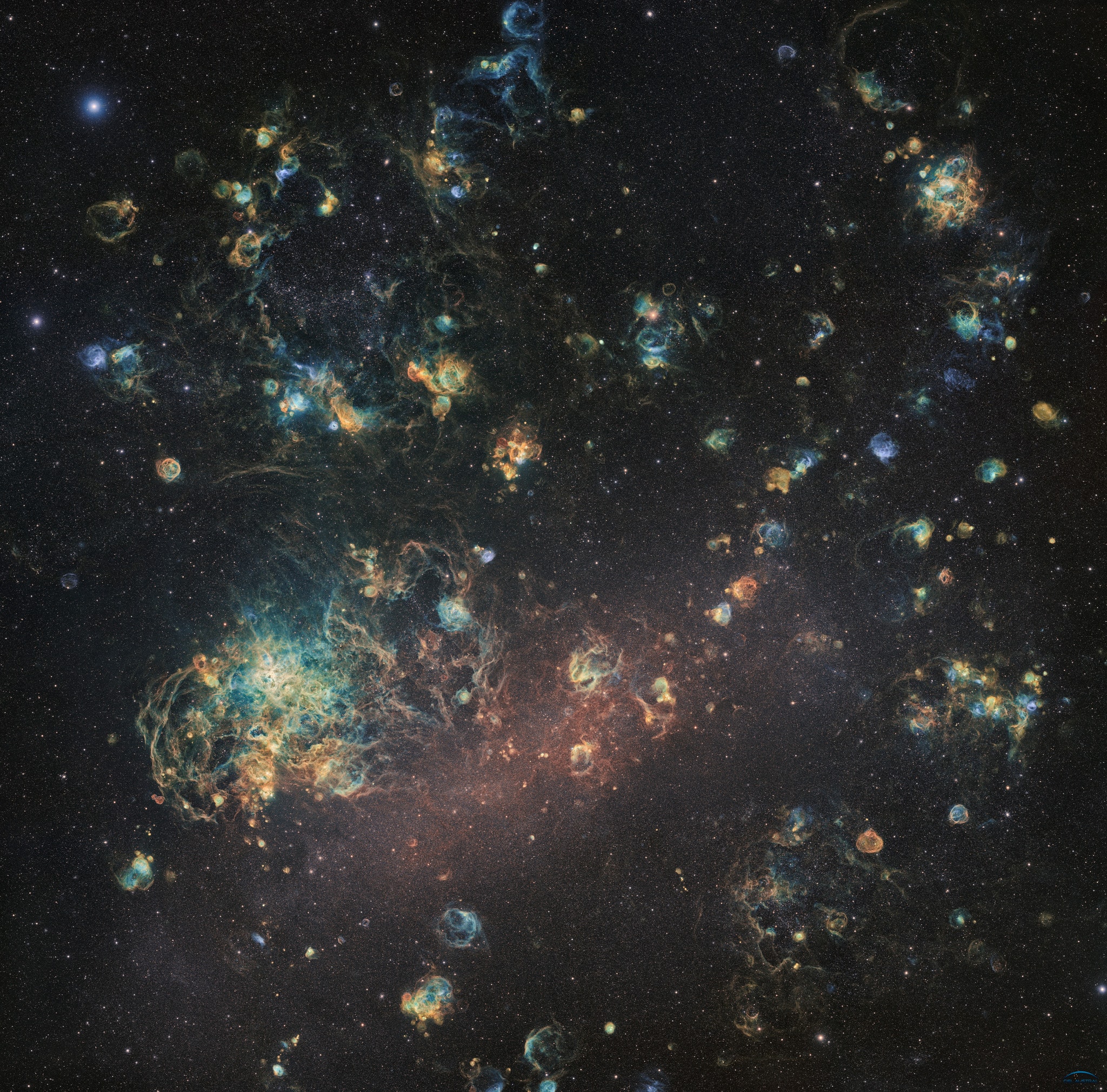The Large Magellanic Cloud (LMC) is an alluring sight in southern skies. But this deep and detailed telescopic view, over 10 months in the making, goes beyond what is visible to most circumnavigators of planet Earth. Spanning over 5 degrees or 10 full moons, the 4x4 panel mosaic was constructed from 3900 frames with a total of 1,060 hours of exposure time in both broadband and narrowband filters. The narrowband filters are designed to transmit only light emitted by sulfur, hydrogen, and oxygen atoms. Ionized by energetic starlight, the atoms emit their characteristic light as electrons are recaptured and the atoms transition to a lower energy state. As a result, in this image the LMC seems covered with its own clouds of ionized gas surrounding its massive, young stars. Sculpted by the strong stellar winds and ultraviolet radiation, the glowing clouds, dominated by emission from hydrogen, are known as H II (ionized hydrogen) regions. Itself composed of many overlapping H II regions, the Tarantula Nebula is the large star forming region at the left. The largest satellite of our Milky Way Galaxy, the LMC is about 15,000 light-years across and lies a mere 160,000 light-years away toward the constellation Dorado.