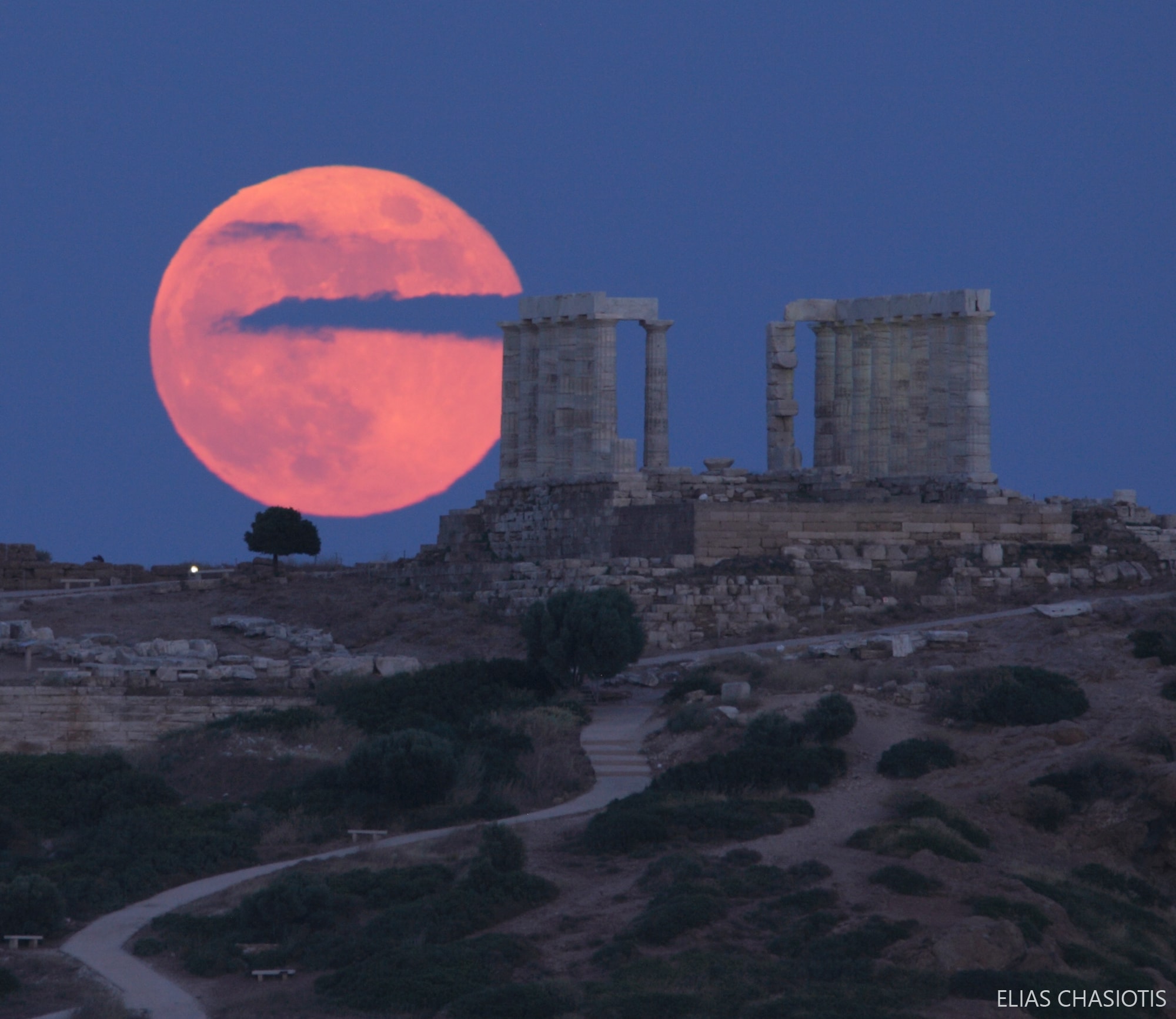 Did you see the full moon last night? If not, tonight's nearly full moon should be almost as good. Because full moons are opposite the Sun, they are visible in the sky when the Sun is not -- which should be nearly all night long tonight, clouds permitting. One nickname for June's full moon is the Strawberry Moon, named for when wild strawberries start to ripen in parts of Earth's northern hemisphere. Different cultures around the globe give this full moon different names, though, including Honey Moon and Rose Moon.  In the foreground of this featured image, taken yesterday in Cape Sounion, Greece, is the 2,400 year-old Temple of Poseidon.  Next month will the 50th anniversary of the time humans first landed on the Moon.