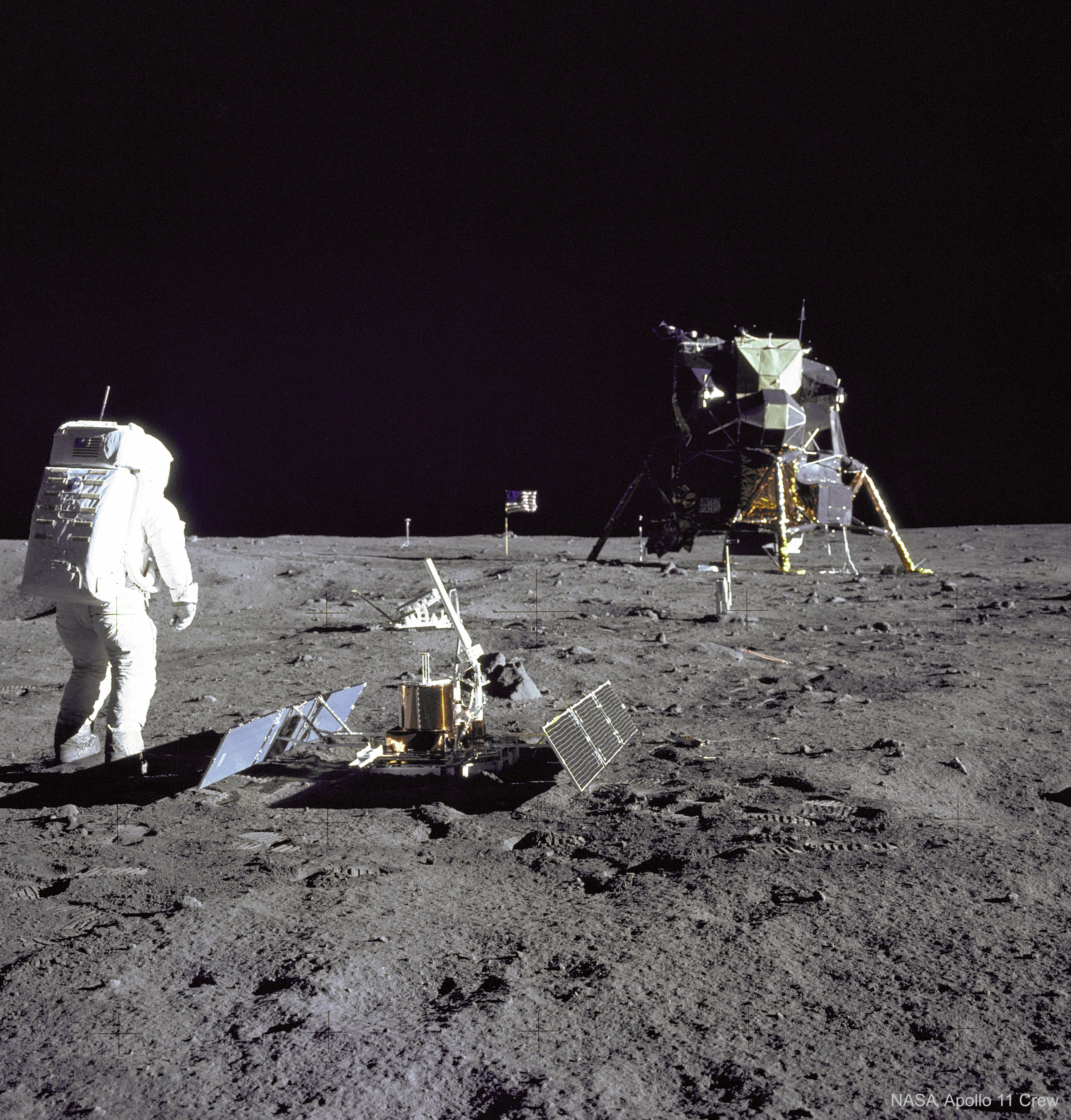 Why are there so many moonquakes?   Analyses of seismometers left on the moon by the Apollo moon landings reveals a surprising number of moonquakes occurring within 100 kilometers of the surface.   In fact, 62 moonquakes were detected in data recorded between 1972 and 1977.   Many of these moonquakes are not only strong enough to move furniture in a lunar apartment, but the stiff rock of the moon continues to vibrate for many minutes, significantly longer than the softer rock earthquakes on Earth.   The cause of the moonquakes remains unknown, but a leading hypothesis is the collapse of underground faults. Regardless of the source, future moon dwellings need to be built to withstand the frequent shakings.   Pictured here 50 years ago today, Apollo 11 astronaut Buzz Aldrin stands beside a recently deployed lunar seismometer, looking back toward the lunar landing module.