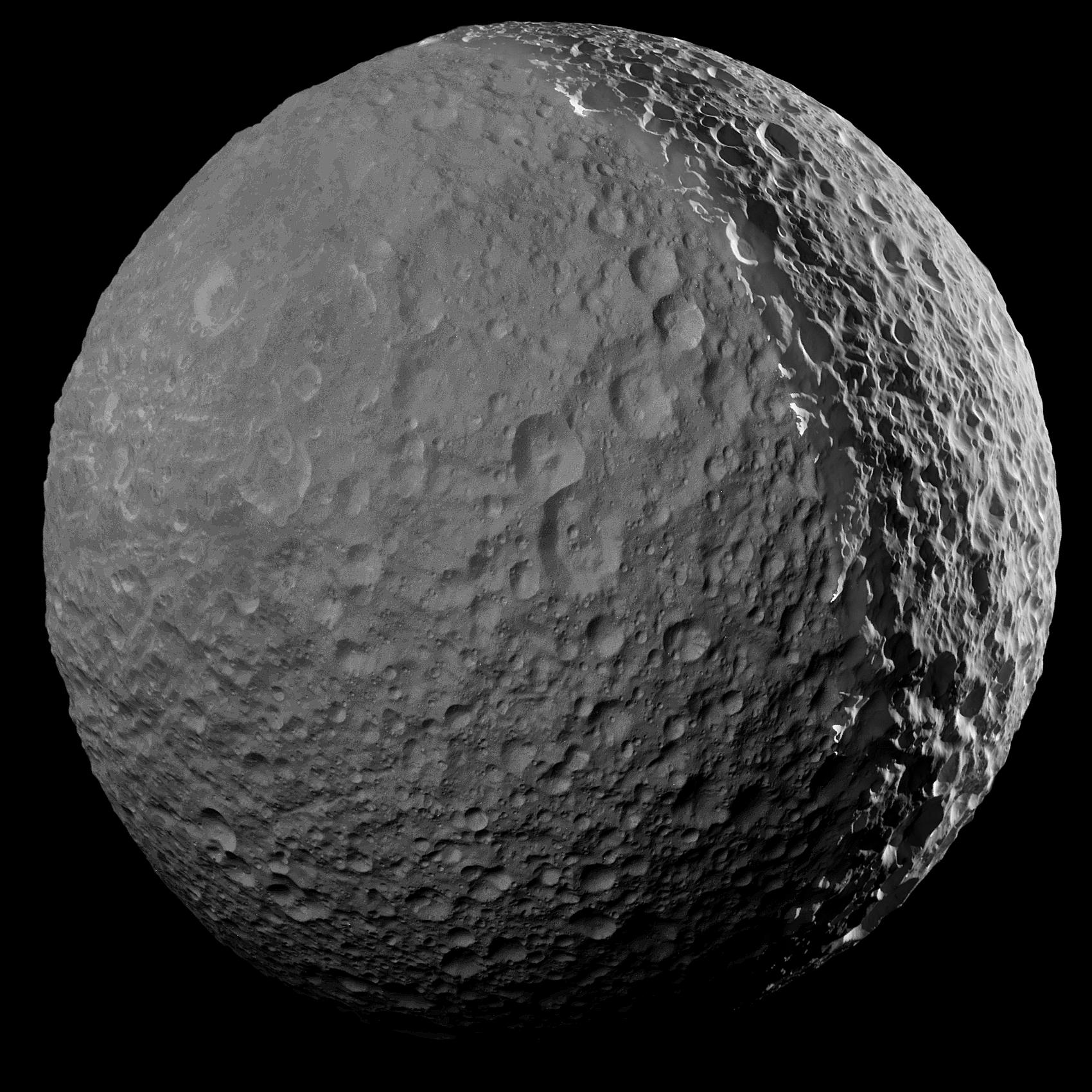 Peering from the shadows, the Saturn-facing hemisphere of Mimas lies in near darkness alongside a dramatic sunlit crescent. The mosaic was captured near the Cassini spacecraft's final close approach on January 30, 2017. Cassini's camera was pointed in a nearly sunward direction only 45,000 kilometers from Mimas. The result is one of the highest resolution views of the icy, crater-pocked, 400 kilometer diameter moon. An enhanced version better reveals the Saturn-facing hemisphere of the synchronously rotating moon lit by sunlight reflected from Saturn itself. To see it, slide your cursor over the image (or follow this link). Other Cassini images of Mimas include the small moon's large and ominous Herschel Crater.