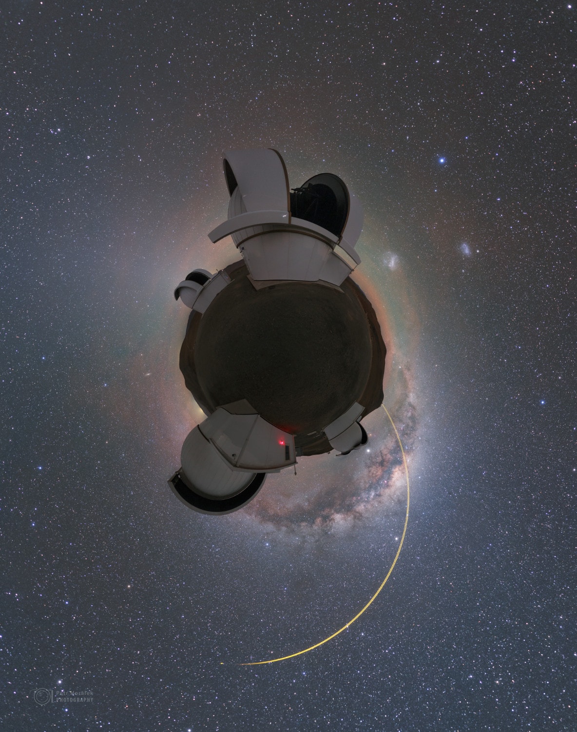Of course this little planet is really planet Earth in a digitally stitched 360 x 180 degree mosaic captured high in the Chilean Atacama desert. The seemingly large domes house the 1-meter diameter telescopes of the SPECULOOS Southern Observatory. With a name creatively inspired by a sweet biscuit treat, the SPECULOOS (Search for habitable Planets EClipsing ULtra-cOOl Stars) telescopes really are hunting for little planets. Their mission is to search for the telltale dimming that indicates the transit of terrestrial exoplanets around the population of nearby, tiny, dim, ultracool stars. On the not-so-distant horizon, adaptive optics laser beams are firing from ESO's mountain top Paranal Observatory. The central Milky Way and Magellanic clouds also shine in this little planet's night sky.