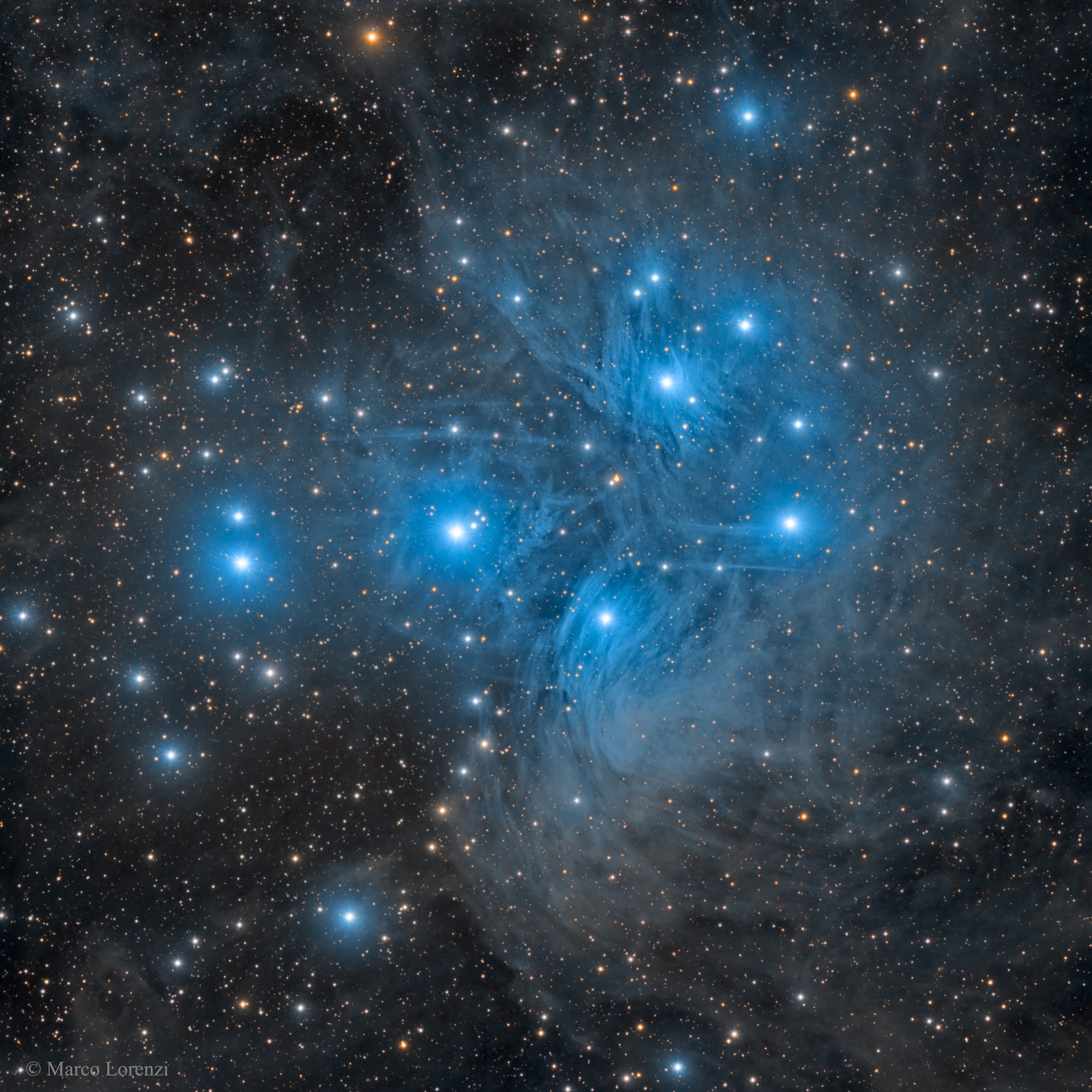 Have you ever seen the Pleiades star cluster? Even if you have, you probably have never seen it as dusty as this. Perhaps the most famous star cluster on the sky, the bright stars of the Pleiades can be seen without binoculars from even the depths of a light-polluted city.  With a long exposure from a dark location, though, the dust cloud surrounding the Pleiades star cluster becomes very evident. The featured exposure took over 12 hours and covers a sky area several times the size of the full moon.  Also known as the Seven Sisters and M45, the Pleiades lies about 400 light years away toward the constellation of the Bull (Taurus).  A common legend with a modern twist is that one of the brighter stars faded since the cluster was named, leaving only six stars visible to the unaided eye. The actual number of Pleiades stars visible, however, may be more or less than seven, depending on the darkness of the surrounding sky and the clarity of the observer's eyesight.