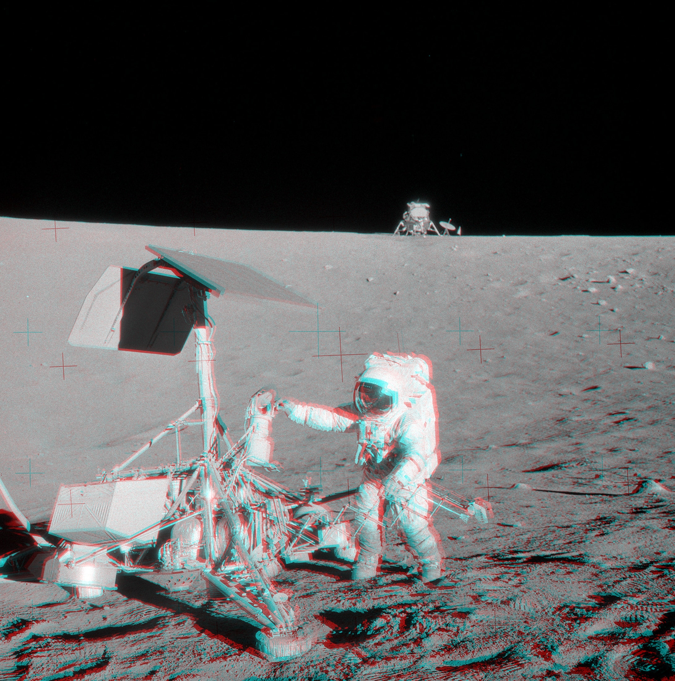 Put on your red/blue glasses and gaze across the western Ocean of Storms on the surface of the Moon. The 3D view features Apollo 12 astronaut Pete Conrad visiting the Surveyor 3 spacecraft 50 years ago in November of 1969. Surveyor 3 had landed at the site on the inside slope of a small crater about 2 1/2 years earlier in April of 1967. Visible on the horizon beyond the far crater wall, Apollo 12's Lunar Module Intrepid touched down less than 200 meters (650 feet) away, easy moonwalking distance from the robotic Surveyor spacecraft. The stereo image was carefully created from two separate pictures (AS12-48-7133, AS12-48-7134) taken on the lunar surface. They depict the scene from only slightly different viewpoints, approximating the separation between human eyes.