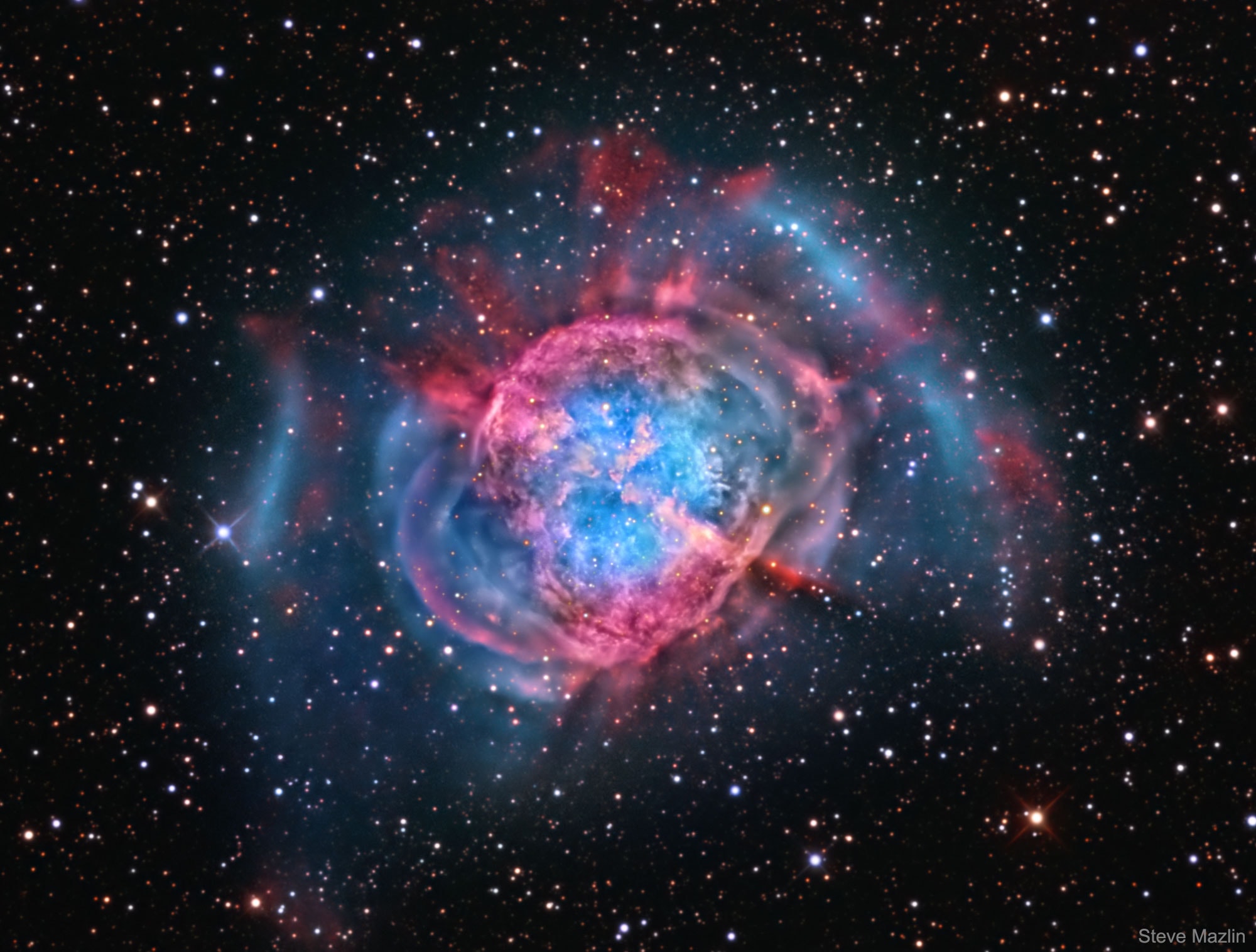Is this what will become of our Sun? Quite possibly.  The first hint of our Sun's future was discovered inadvertently in 1764. At that time, Charles Messier was compiling a list of diffuse objects not to be confused with comets. The 27th object on Messier's list, now known as M27 or the Dumbbell Nebula, is a planetary nebula, the type of nebula our Sun will produce when nuclear fusion stops in its core. M27 is one of the brightest planetary nebulae on the sky, and can be seen toward the constellation of the Fox (Vulpecula) with binoculars. It takes light about 1000 years to reach us from M27, featured here in colors emitted by hydrogen and oxygen. Understanding the physics and significance of M27 was well beyond 18th century science. Even today, many things remain mysterious about bipolar planetary nebula like M27, including the physical mechanism that expels a low-mass star's gaseous outer-envelope, leaving an X-ray hot white dwarf.   APOD across world languages: Arabic, Catalan, Chinese (Beijing), Chinese (Taiwan), Croatian, Czech, Dutch, Farsi, French, French, German, Hebrew, Indonesian, Japanese, Korean, Montenegrin, Polish, Russian, Serbian, Slovenian,  Spanish and Ukrainian