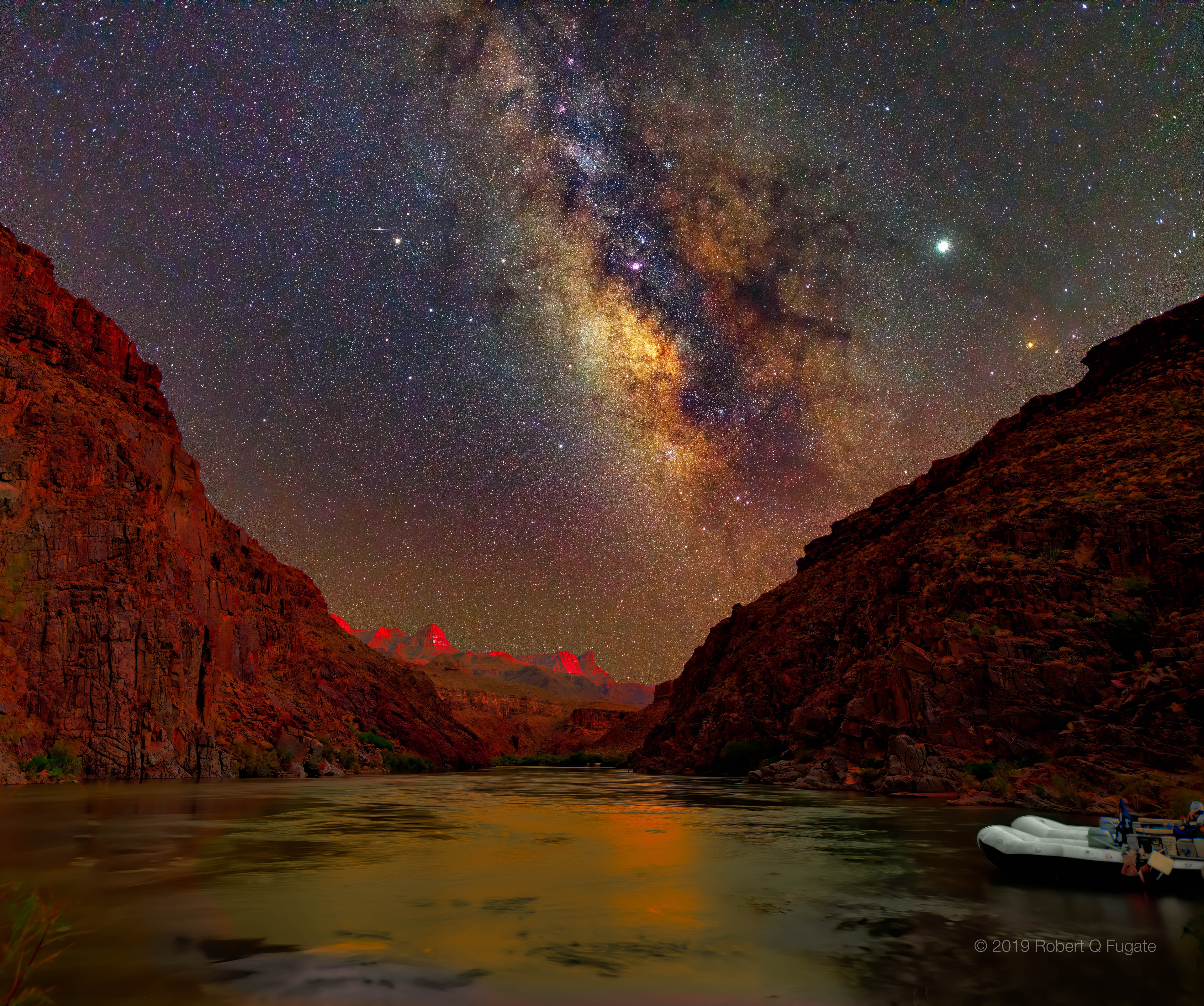 Seeing mountain peaks glow red from inside the Grand Canyon was one of the most incredible sunset experiences of this amateur photographer's life. They appeared even more incredible later, when digitally combined with an exposure of the night sky -- taken by the same camera and from the same location -- an hour later.  The two images were taken last August from the 220 Mile Canyon campsite on the Colorado River, Arizona, USA. The peaks glow red because they were lit by an unusually red sunset.  Later, high above, the band of the Milky Way Galaxy angled dramatically down, filled with stars, nebula, and dark clouds of dust. To the Milky Way's left is the planet Saturn, while to the right is the brighter Jupiter.  Although Jupiter and Saturn are now hard to see, Venus will be visible and quite bright to the west in clear skies, just after sunset, for the next two months.    Astrophotography with Your Computer: NASA's Astrophoto Challenges