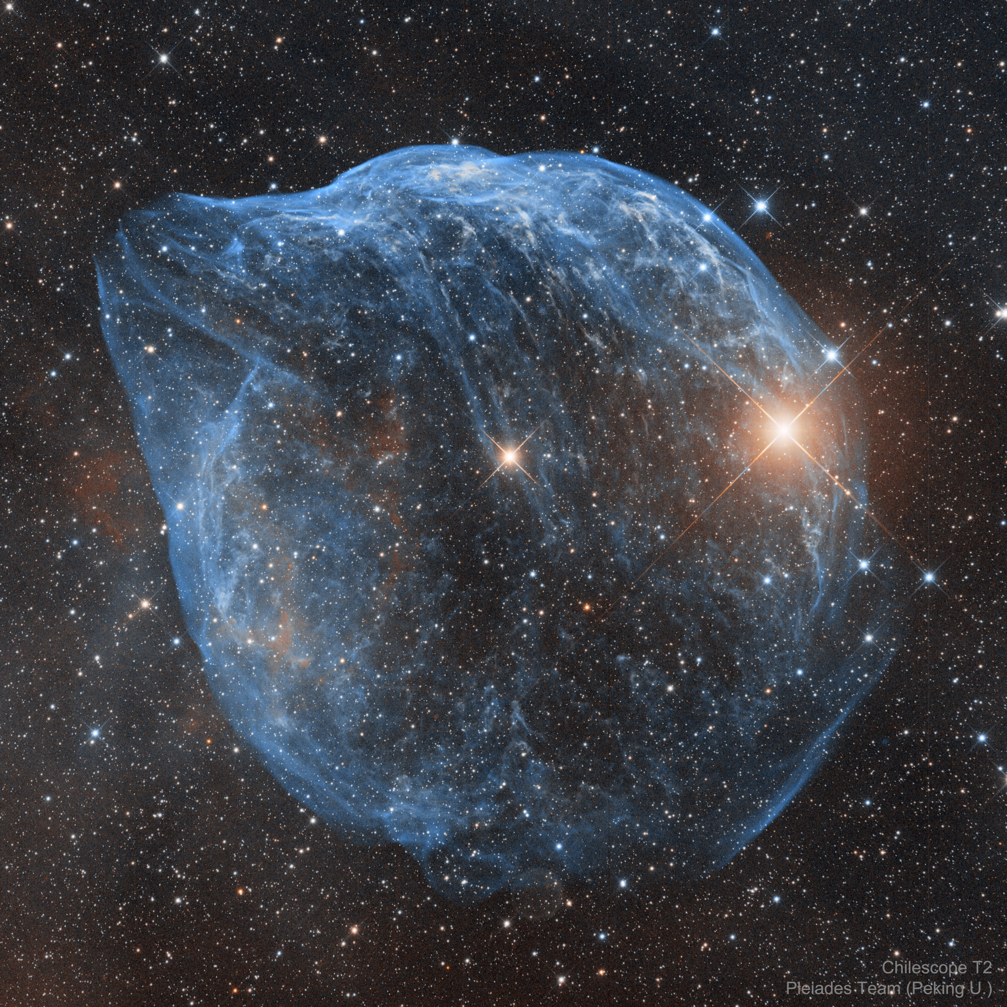 Blown by fast winds from a hot, massive star, this cosmic bubble is much larger than the dolphin it appears to be. Cataloged as Sharpless 2-308 it lies some 5,200 light-years away toward the constellation of the Big Dog (Canis Major) and covers slightly more of the sky than a Full Moon. That corresponds to a diameter of 60 light-years at its estimated distance. The massive star that created the bubble, a Wolf-Rayet star, is the bright one near the center of the nebula. Wolf-Rayet stars have over 20 times the mass of the Sun and are thought to be in a brief, pre-supernova phase of massive star evolution. Fast winds from this Wolf-Rayet star create the bubble-shaped nebula as they sweep up slower moving material from an earlier phase of evolution. The windblown nebula has an age of about 70,000 years. Relatively faint emission captured in the featured expansive image is dominated by the glow of ionized oxygen atoms mapped to a blue hue.