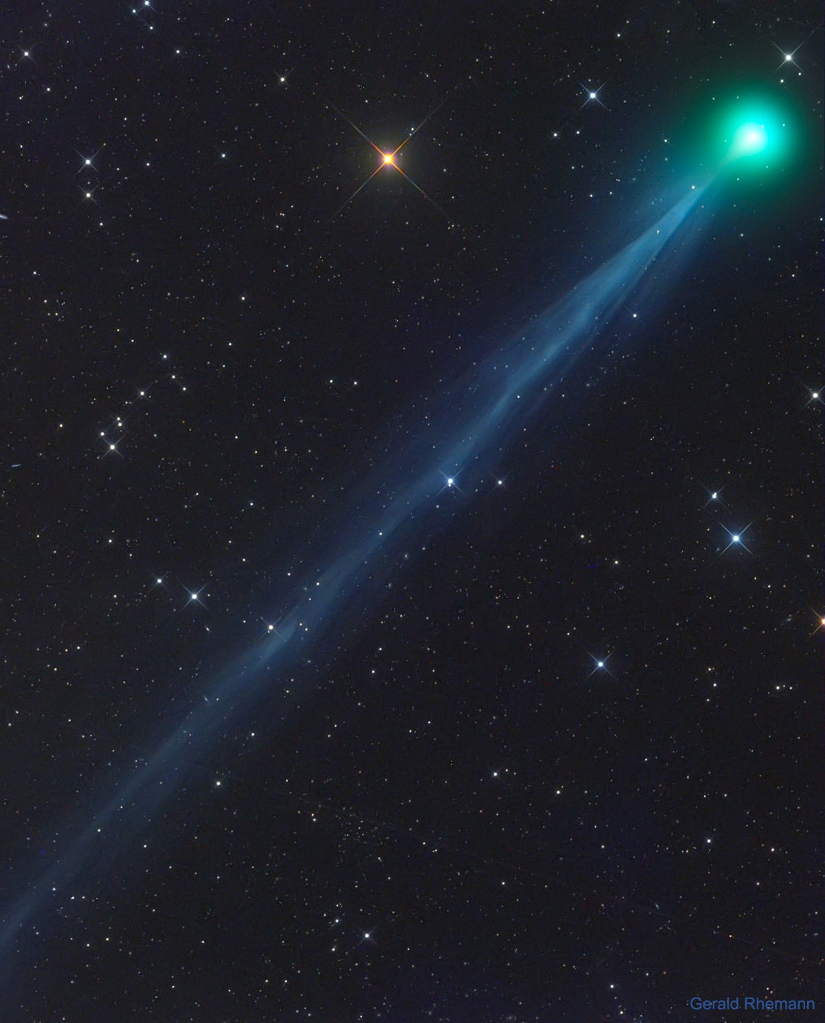 Newly discovered Comet SWAN has already developed an impressive tail.  The comet came in from the outer Solar System and has just passed inside the orbit of the Earth. Officially designated C/2020 F8 (SWAN), this outgassing interplanetary iceberg will pass its closest to the Earth on May 13, and closest to the Sun on May 27.  The comet was first noticed in late March by an astronomy enthusiast looking through images taken by ESA's and NASA's Sun-orbiting SOHO spacecraft, and is named for this spacecraft's Solar Wind Anisotropies (SWAN) camera. The featured image, taken from the dark skies in Namibia in mid-April, captured Comet SWAN's green-glowing coma and unexpectedly long, detailed, and blue ion-tail.   Although the brightness of comets are notoriously hard to predict, some models have Comet SWAN becoming bright enough to see with the unaided eye during June.    Experts Debate: How will humanity first discover extraterrestrial life?